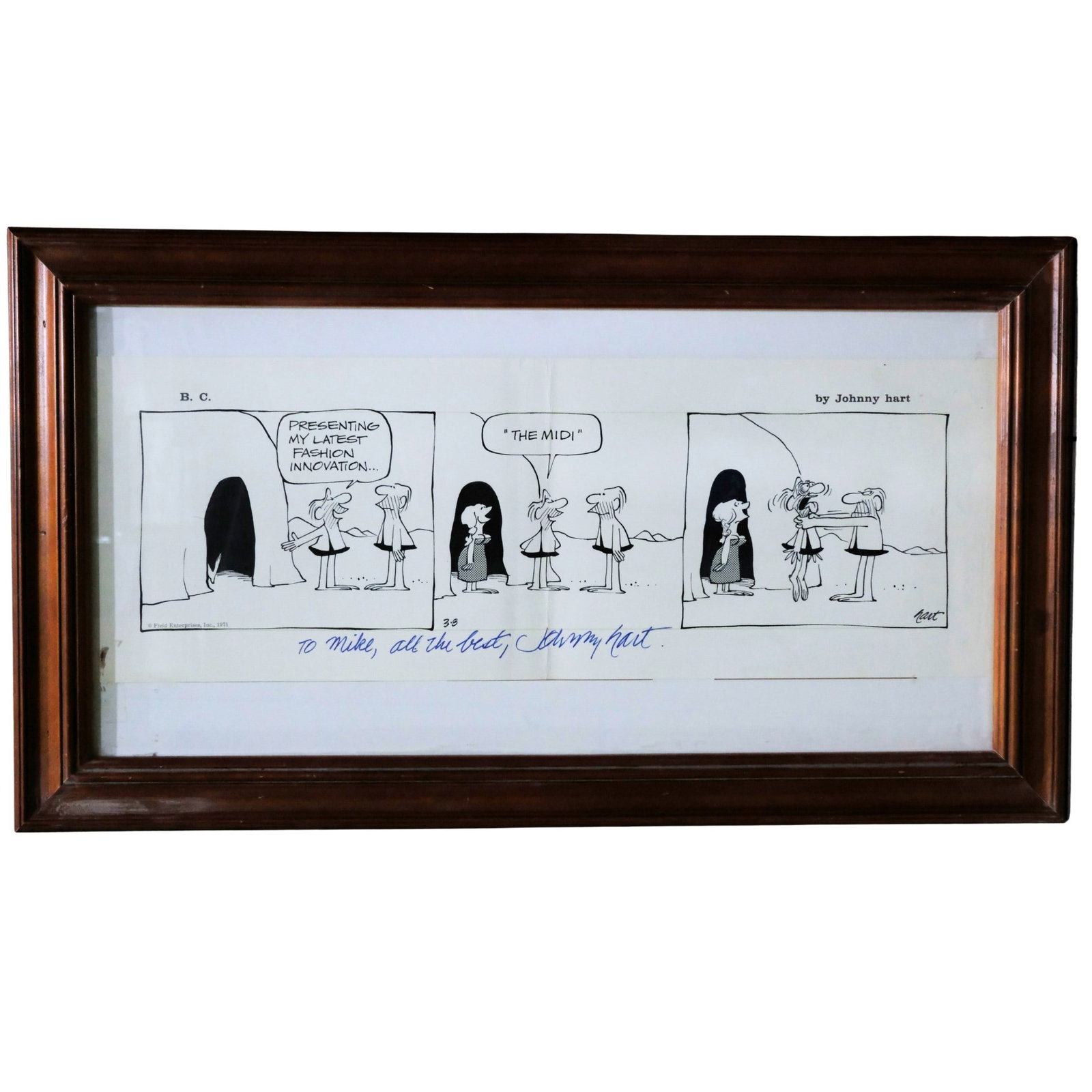 Johnny Hart autograph on a framed copy of his famous 'B.C.' comic strip: Iconic Size Glass Frame Measures 58x32cm Medium Autographs Exhibited General