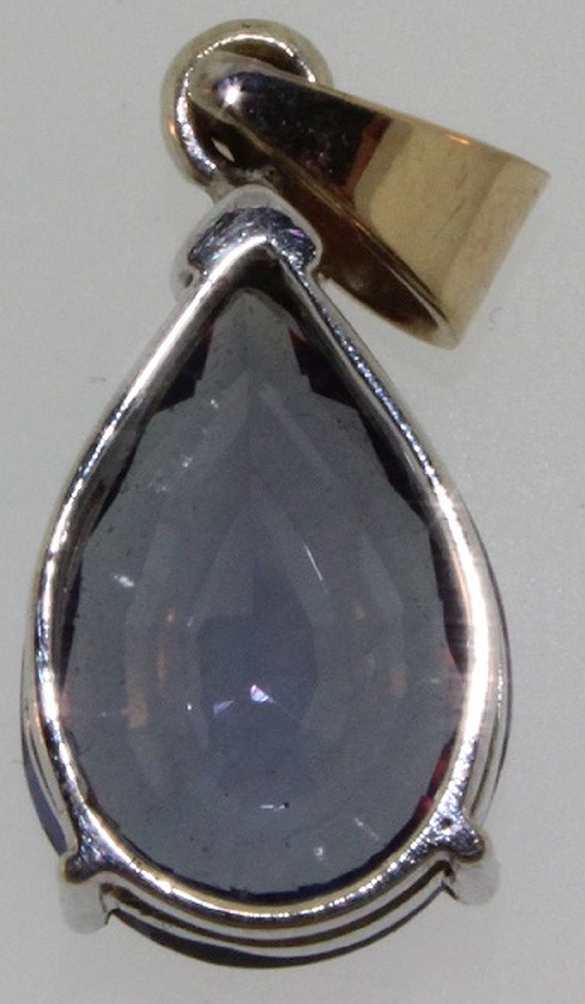 Pendant with simulated Colour-change Stone in a 9ct White Gold Surround - 2