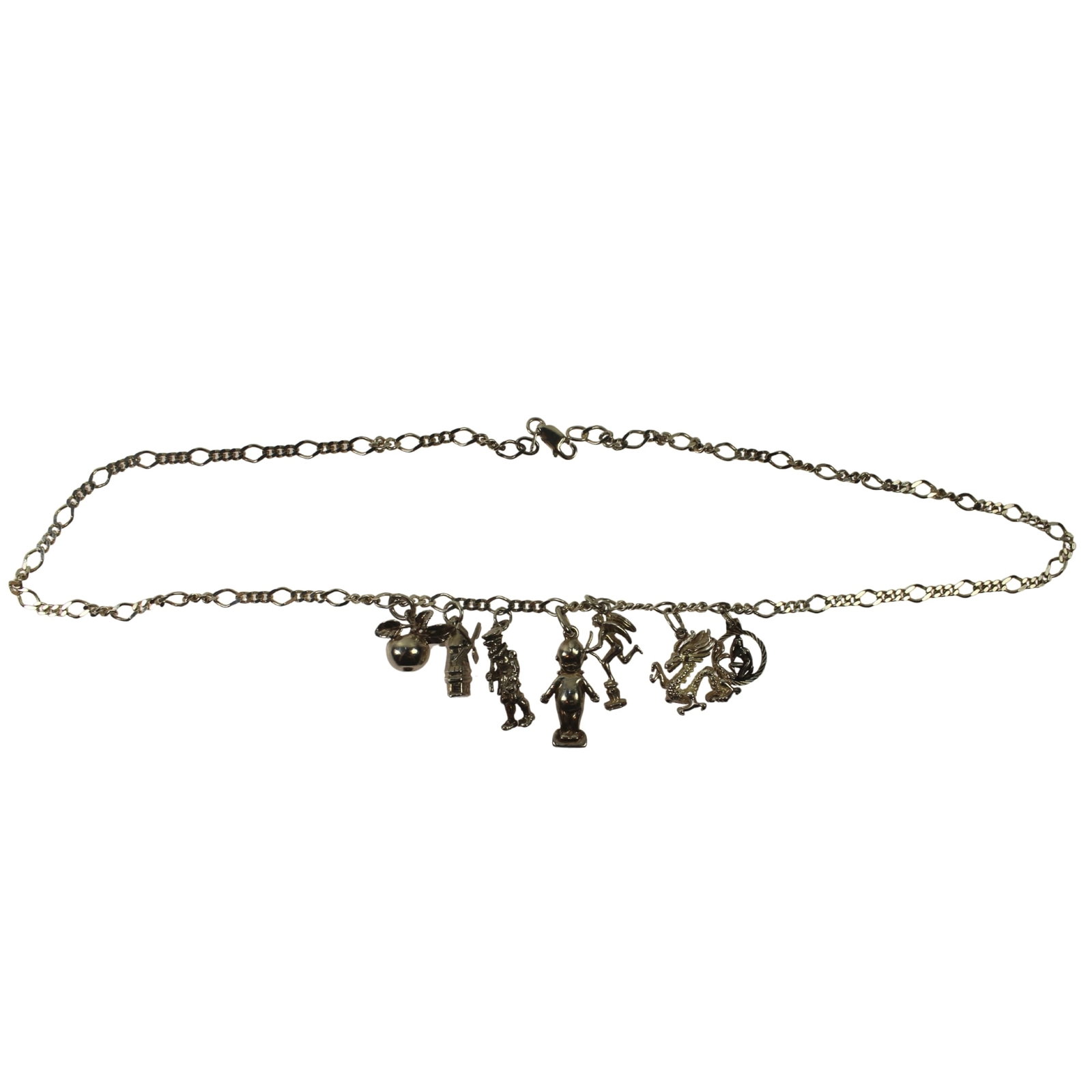 Seven Sterling (925) Silver Charms attached to a Link Necklace: . Size Open length 48cms : Weight 26gms Medium Jewelry