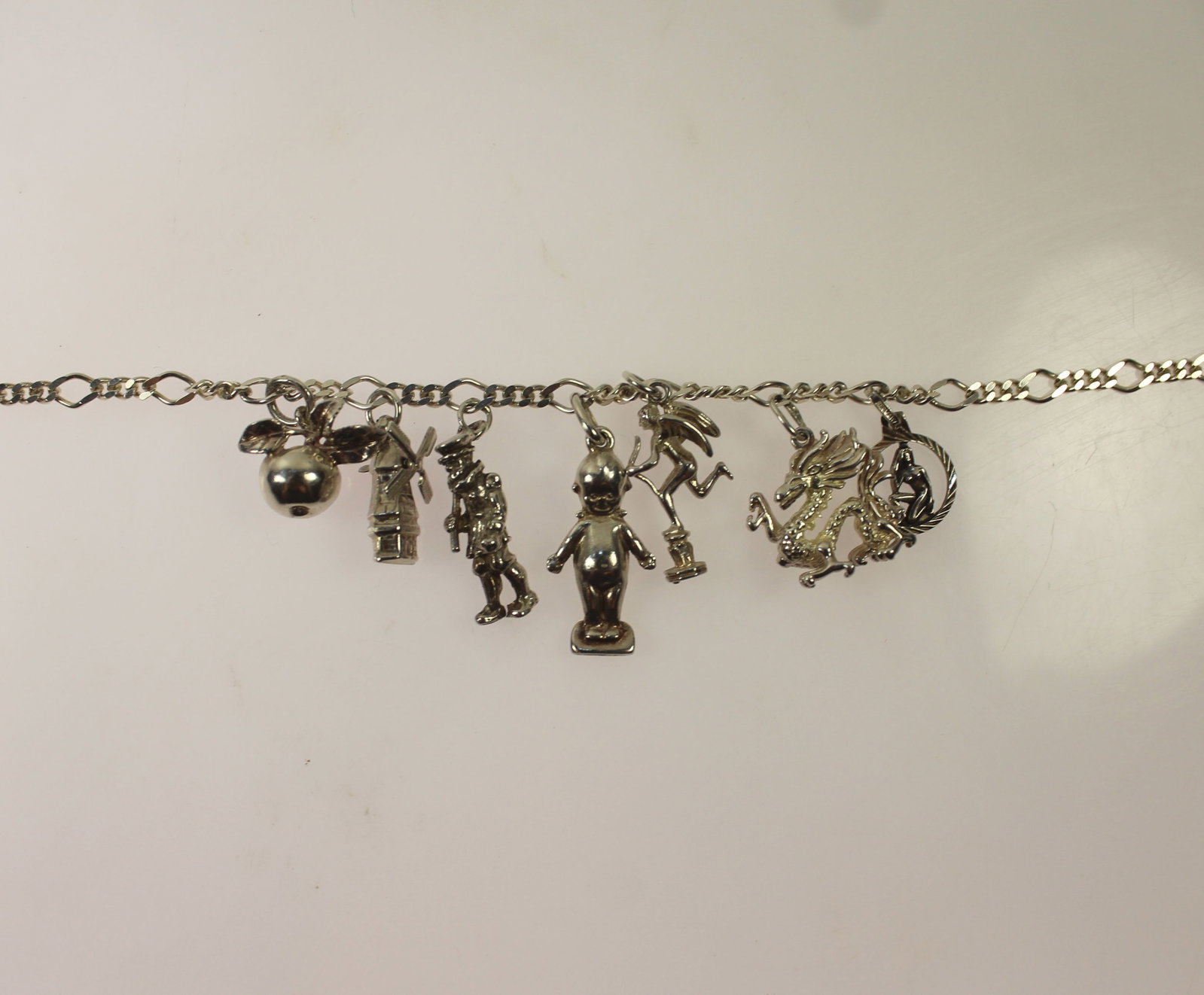 Seven Sterling (925) Silver Charms attached to a Link Necklace - 2