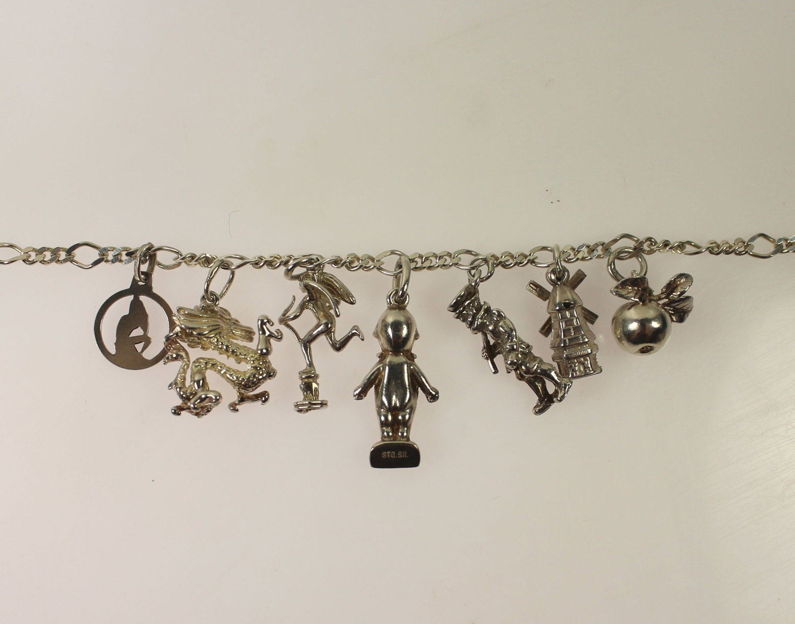 Seven Sterling (925) Silver Charms attached to a Link Necklace - 3