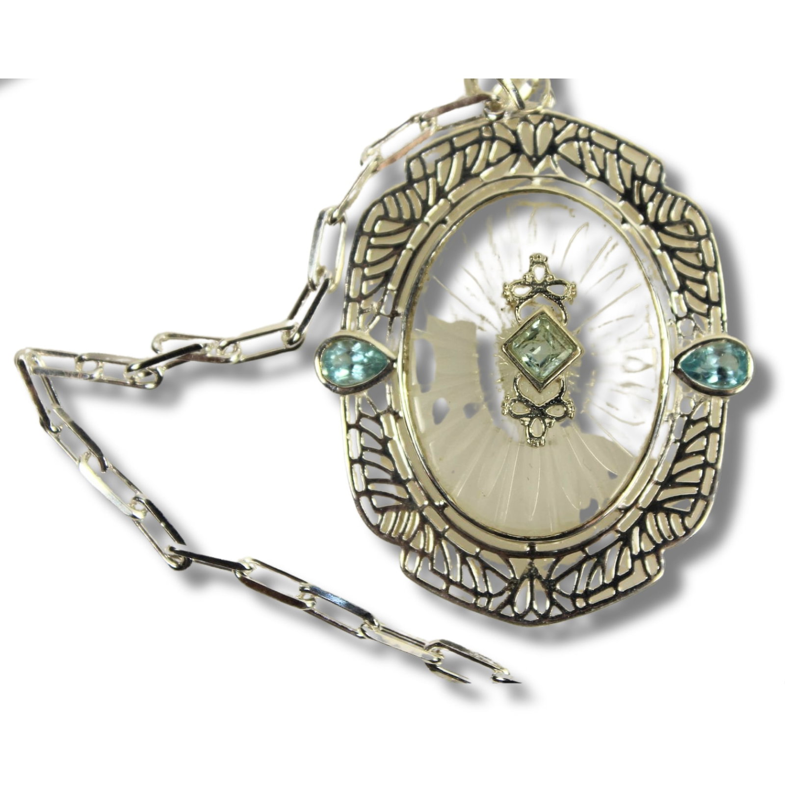 Camphor Glass Pendant in intricate Sterling (925) Silver Surround: Augmented with Blue Topaz Size Combined weight 27.8Hangs 35cms Medium Jewelry