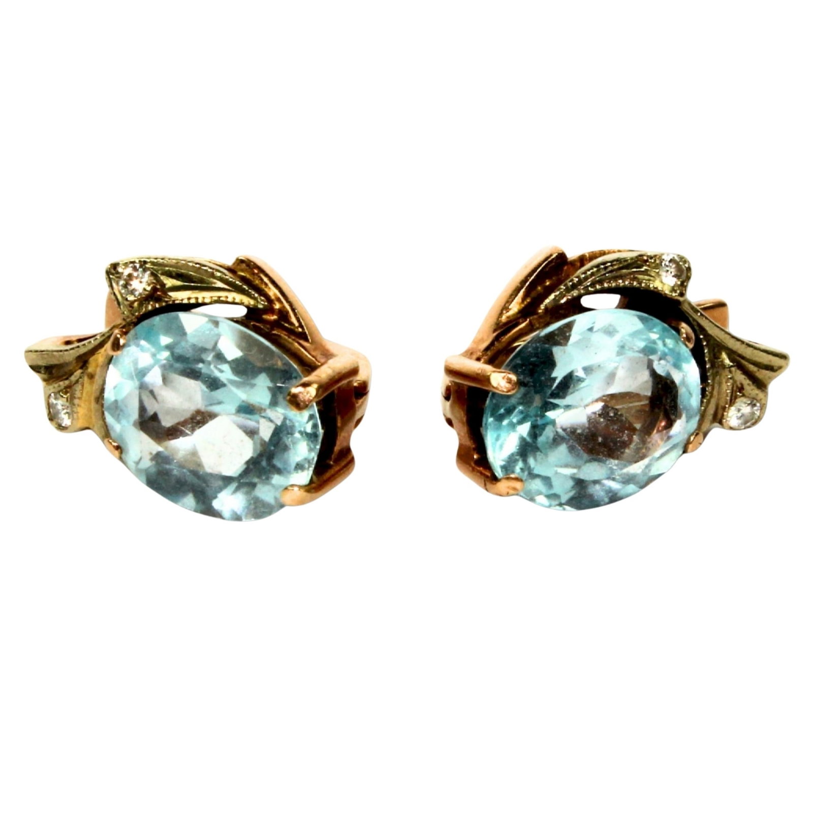 Aquamarine Earrings in 14ct Yellow Gold with small Diamonds (Pair): . Size Combined weight 5.43gms Medium Jewelry