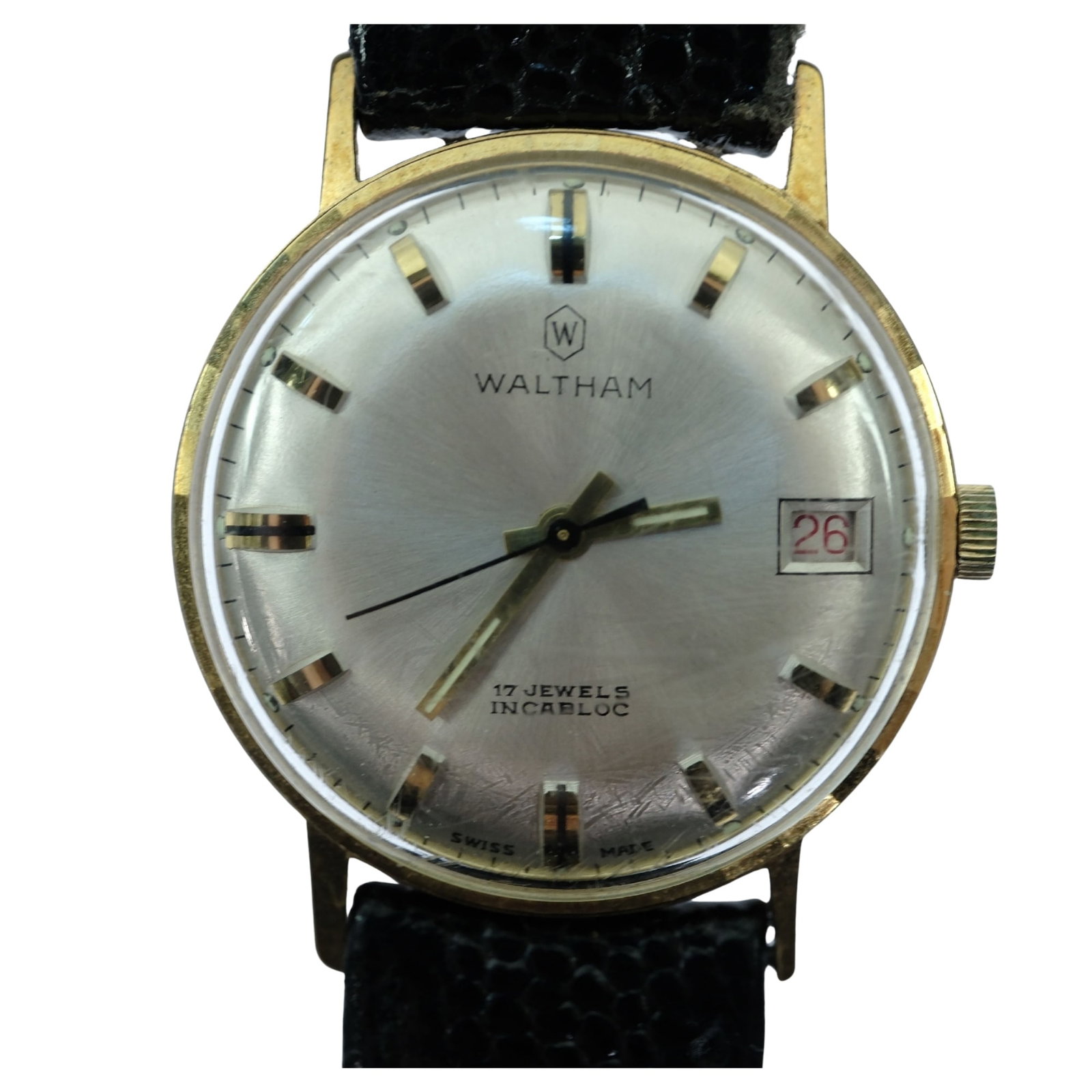 Vintage Mens Waltham Wristwatch with Gold Case & Silver Dial: 17 Jewels. Date Function. New Leather Band Size Case approx 35mm Condition Mechanical. Working, Scuffs to original glass Medium Jewelry
