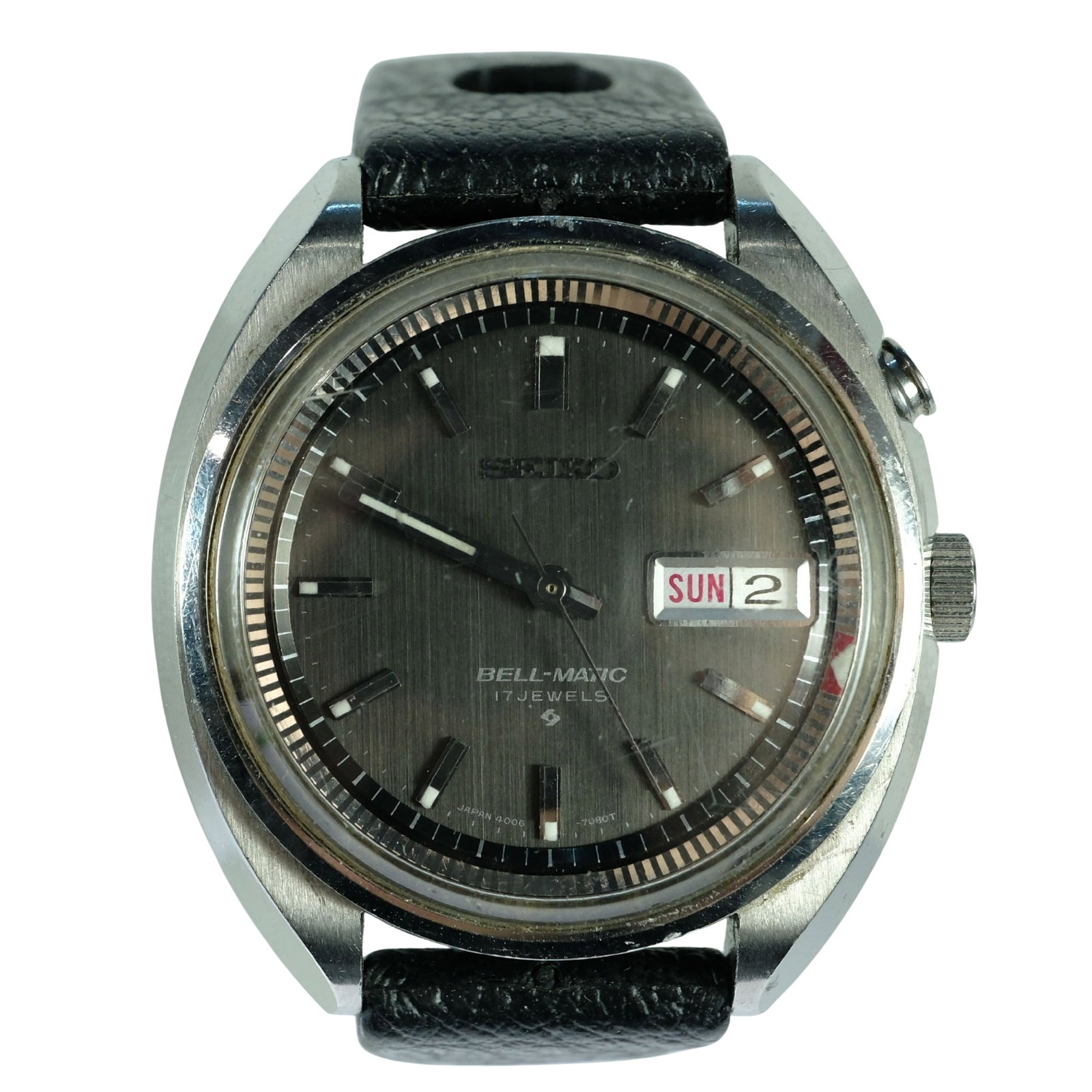Vintage Men's Seiko 'Bellmatic' Alarm Wristwatch with Silver Case & Black Dial: Model# 4006 - 7002. 17 Jewels. Day & Date Function. New Black Tropic Sport Band Size Case approx 37mm Condition Automatic. Working Medium Jewelry