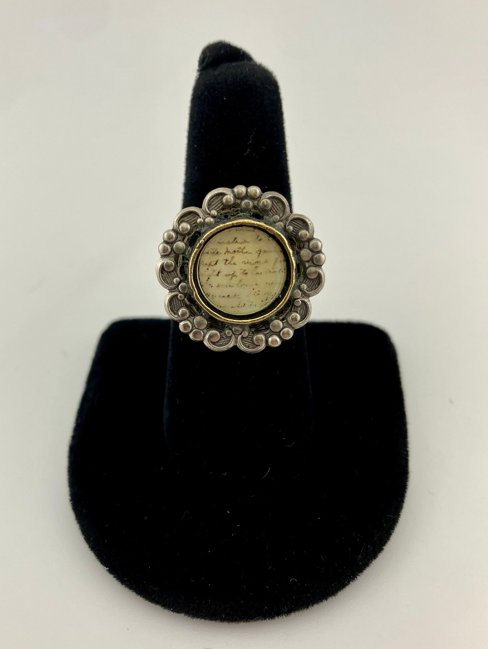 Sterling ring with written note under glass (1 of 6)