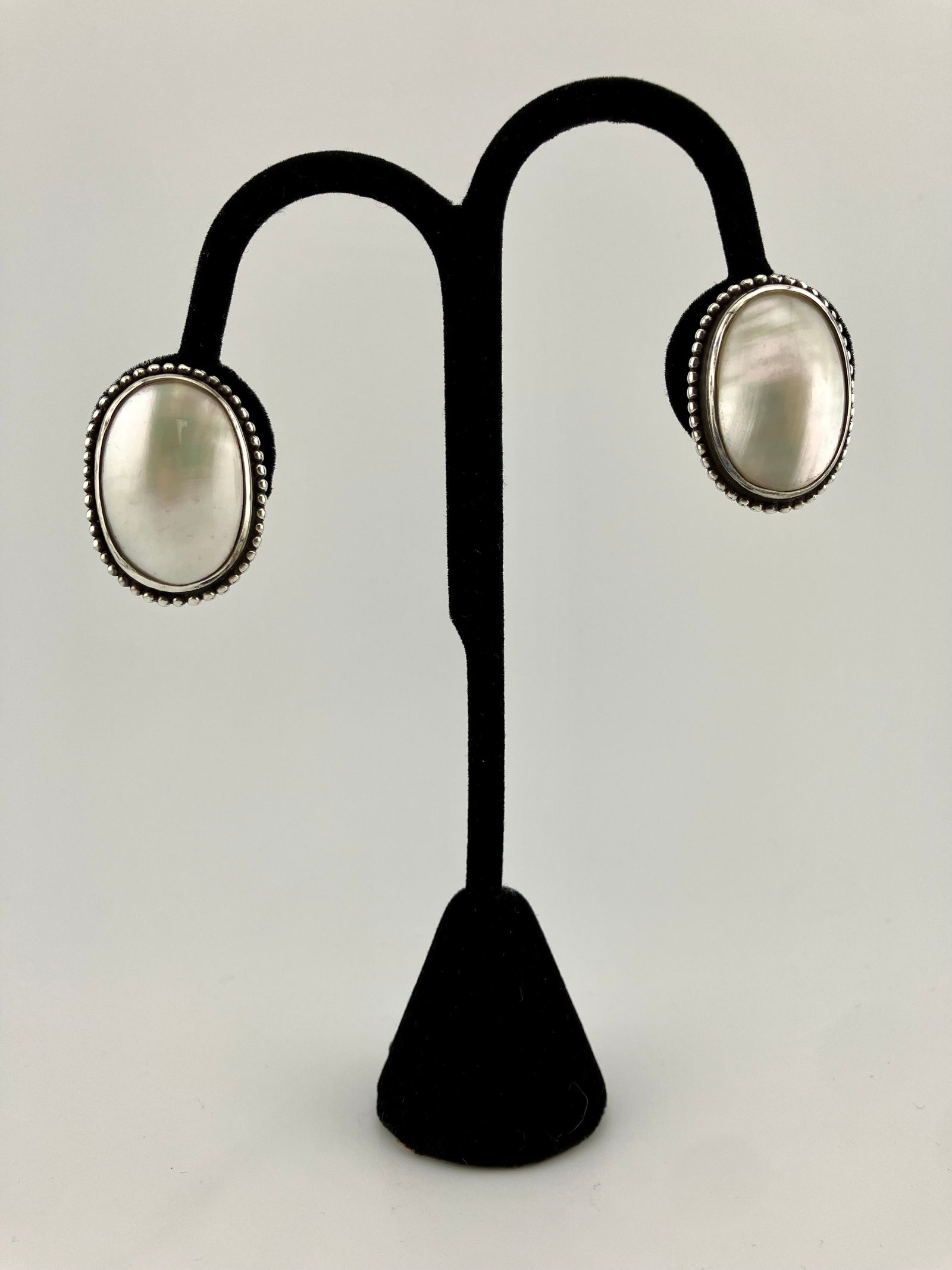 Stephen Dweck Mother of Pearl Sterling Clip Earrings: Stephen Dweck Mother of Pearl Sterling Clip Earrings. Measures 7/8" x 1.25".