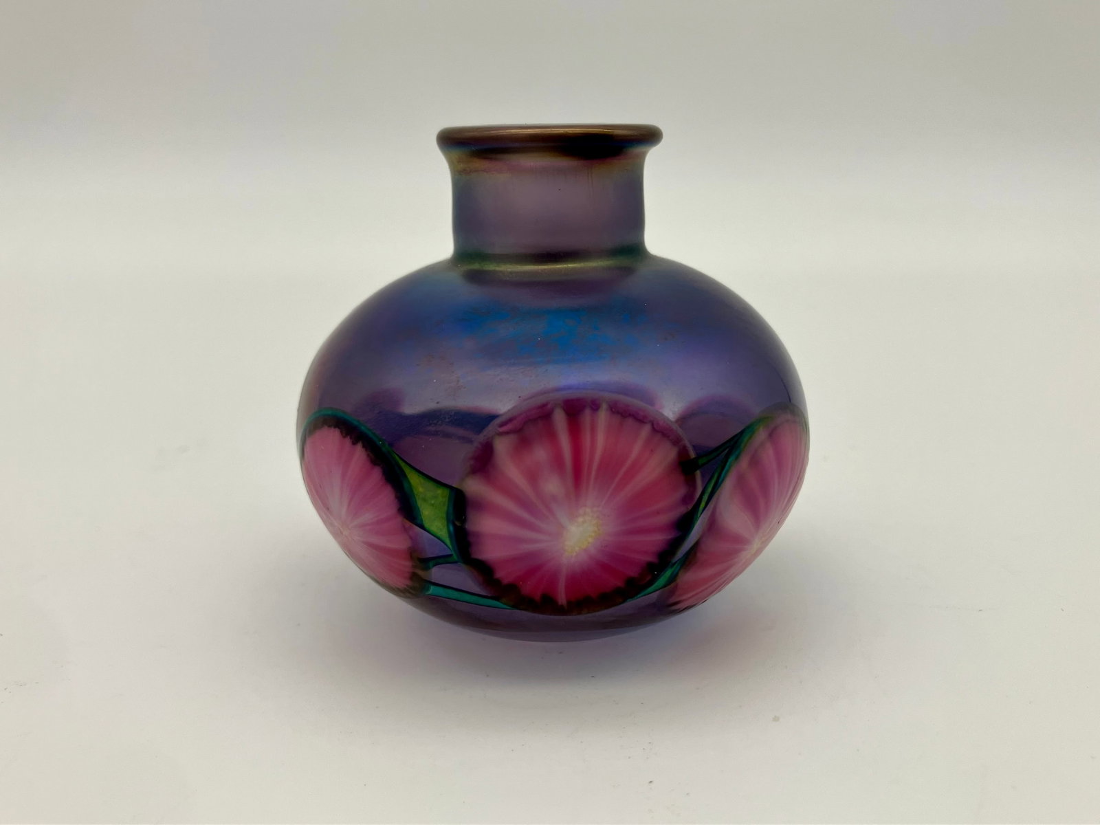 Lotton Studios Art Glass Vase: Beautiful floral art glass bud vase. Signature on the bottom, dated '94. Dimensions: 2x2in.