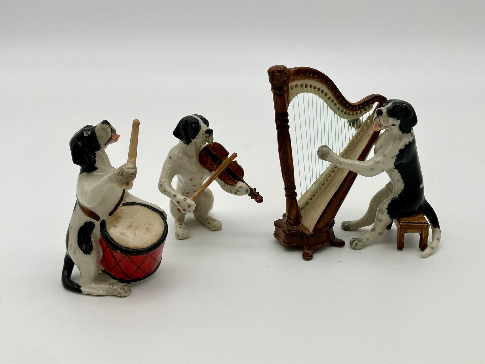 Kilma Ceramic Musical Dog Figurines: These three Kilma figurines feature dogs playing musical instruments. Quite absurd.