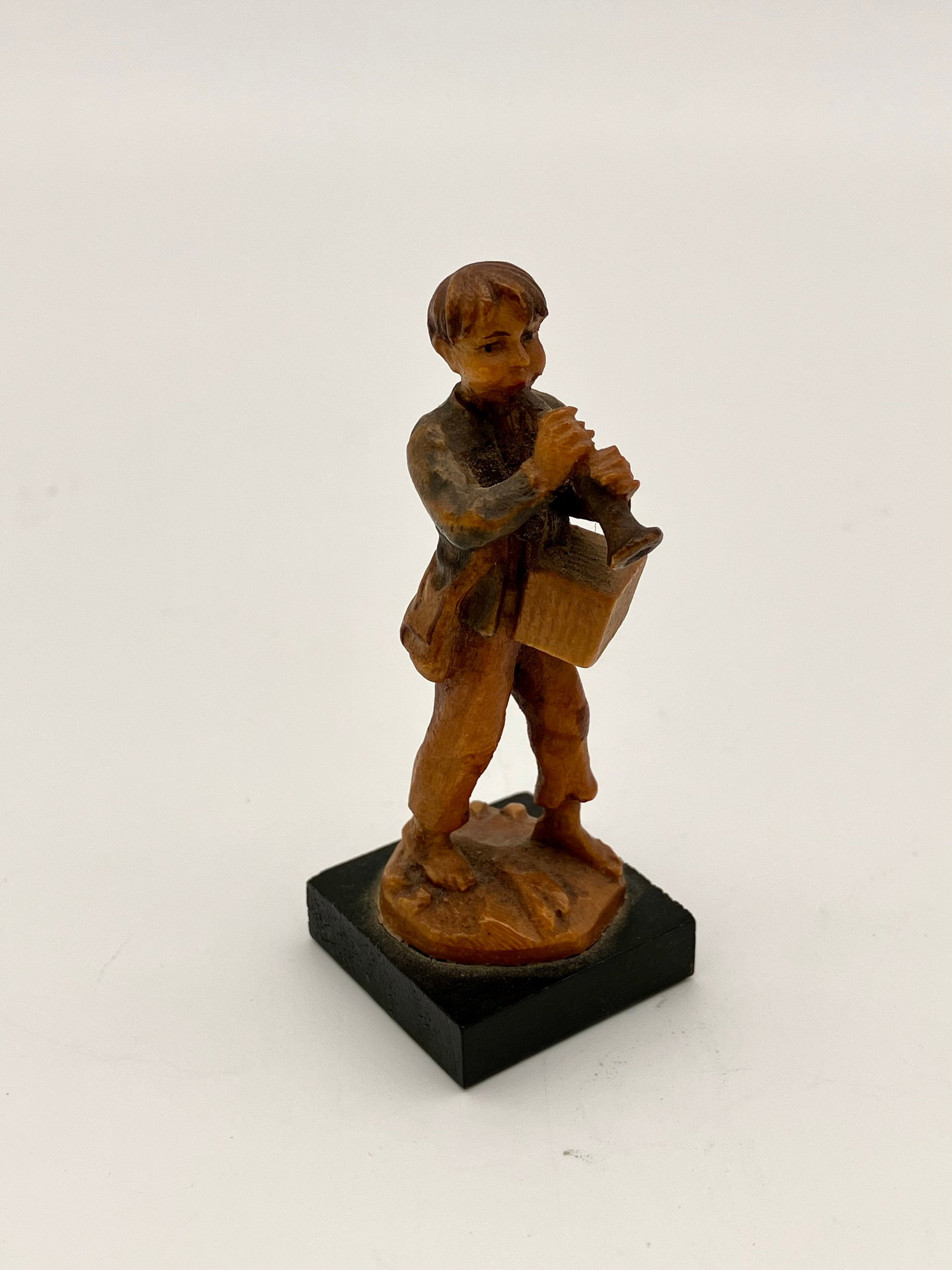Anri Carved Boy with Trumpet figurine: This Anri figurine measures 2.5" tall and is unsigned.