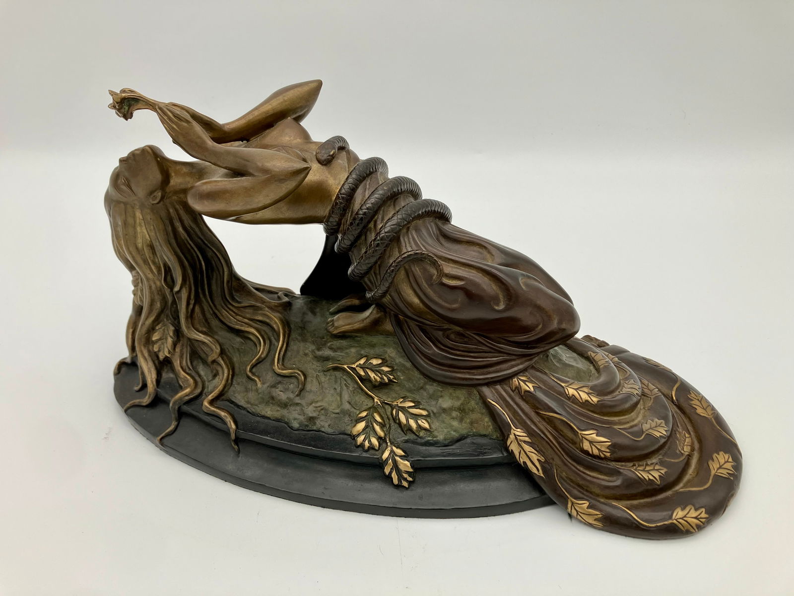 Erte “Perfume” Bronze Sculpture: 1984 edition of the Erte “Perfume” figural sculpture. Stamped with makers mark. Edition #69/300.Measures 7.75” tall and 15” long.