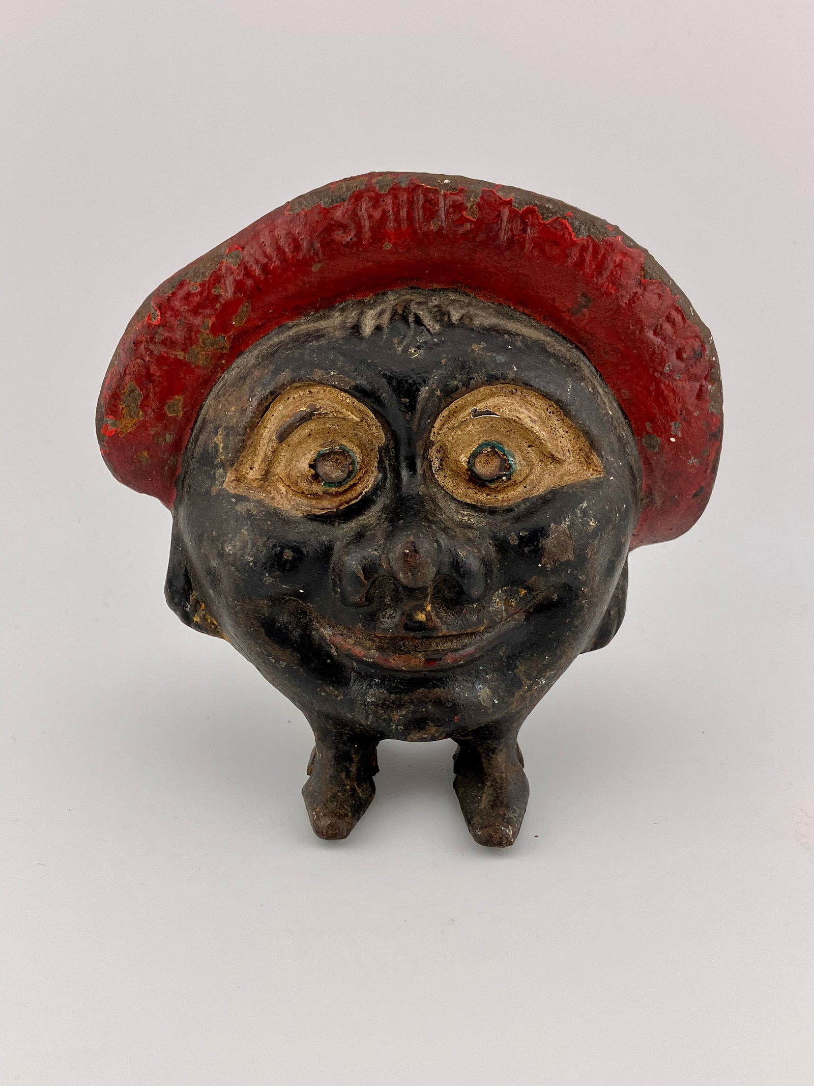 Antique Save and Smile Money Box Cast Iron Bank: Early 20th century version of this bank without the "Made in England" stamp of the earliest versions.