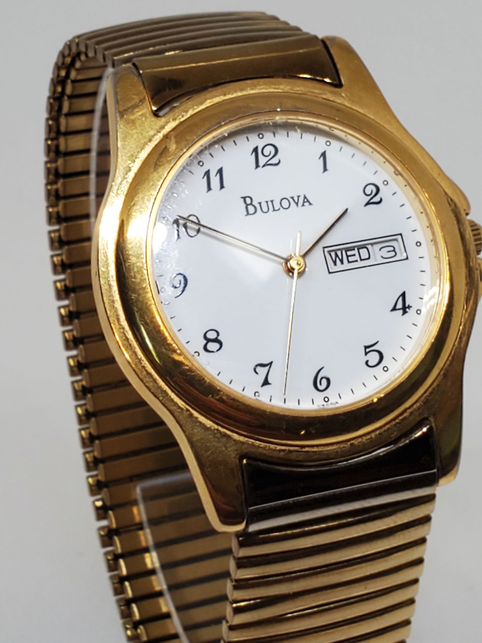 Bulova T7 Watch, 1990s - Vintage Collection -: Working condition Bulova T7 is a beautifully crafted luxury watch that embodies timeless elegance and sophistication. With its sleek circular case and clean white dial, this quartz-powered watch combi