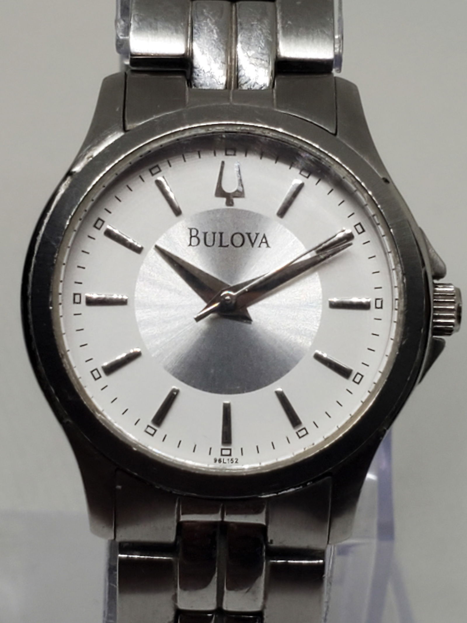 Bulova SIlver Tone Ladies Watch, 2000s - Vintage Collection -: Bulova C837532 dress watch in working condition. Featuring a silver-tone case and a sophisticated white and brushed-silver dial, this timepiece exudes class and refinement. The metallic bracelet, desi