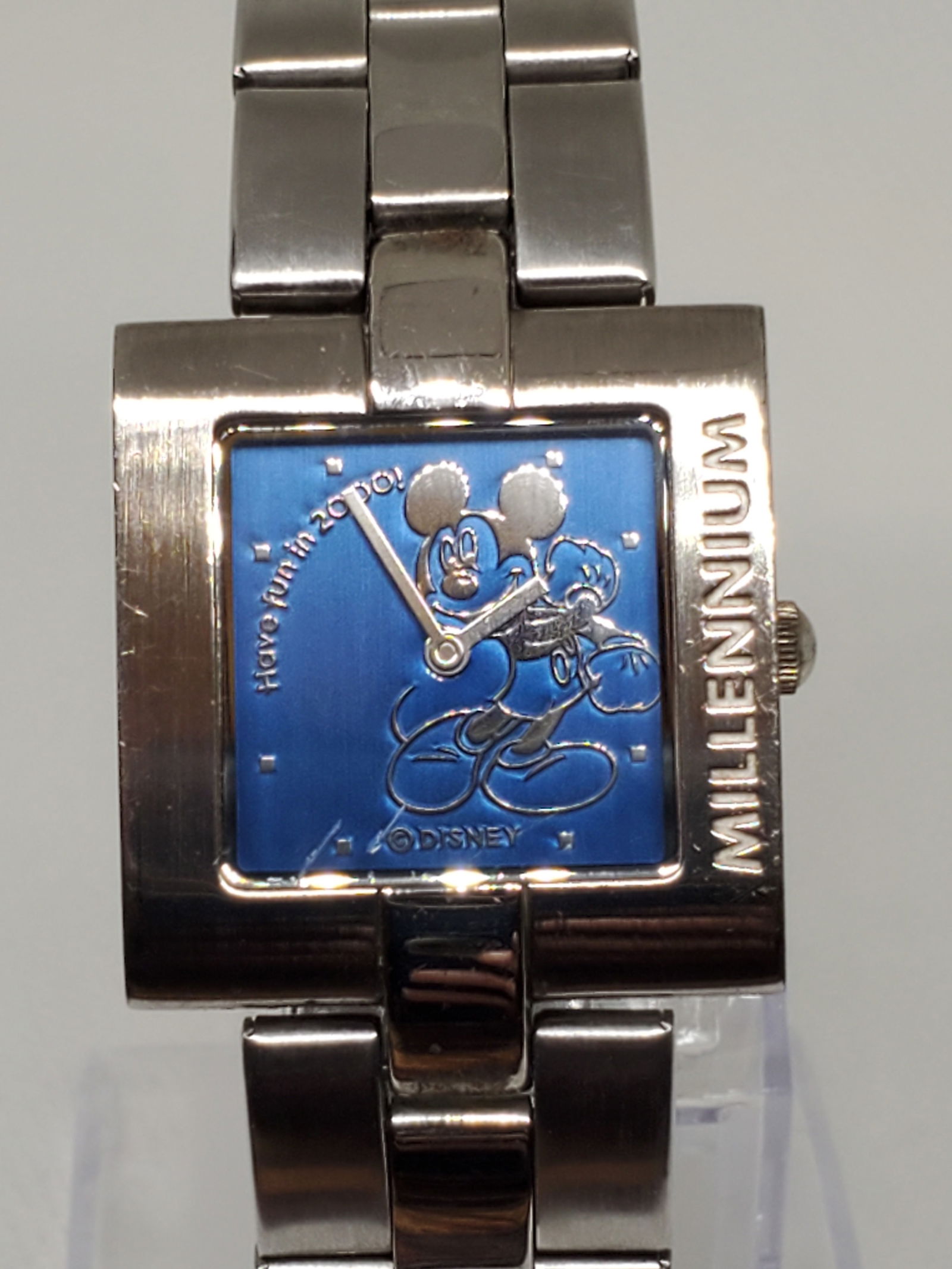Disney Mickey Millenium Watch, 2000: Working condition - Capture a touch of whimsy and timeless style with the Disney Mickey Millenium watch. This playful yet sophisticated timepiece celebrates the beloved Mickey Mouse character with a v