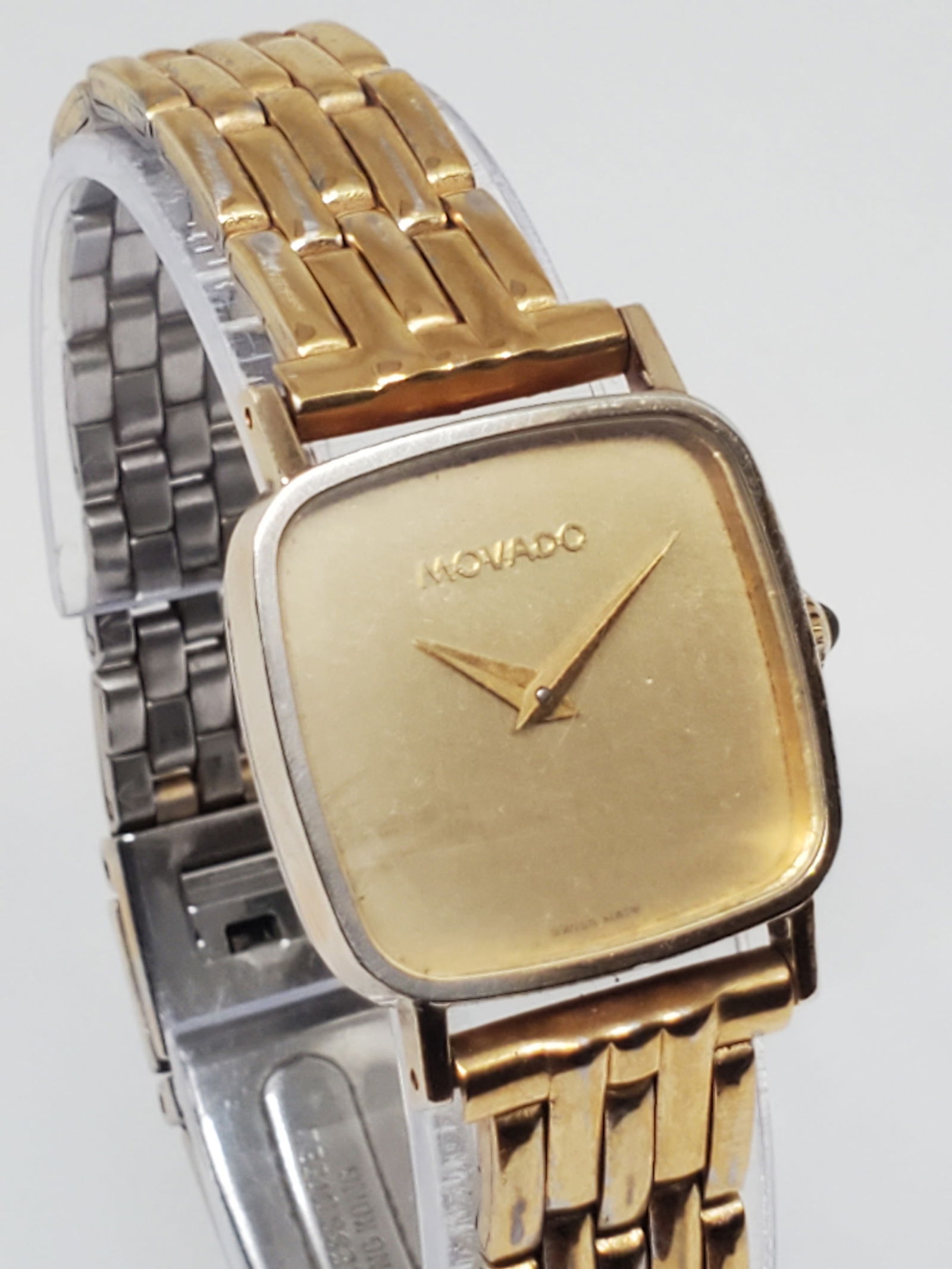 Movado-Zenith Gold Plated Manual Watch, 1970s: Working condition Movado 20.0570.305, a stunning piece that exemplifies luxury and timeless design. This watch features a manual movement powered by Zenith, offering precision and craftsmanship. The g