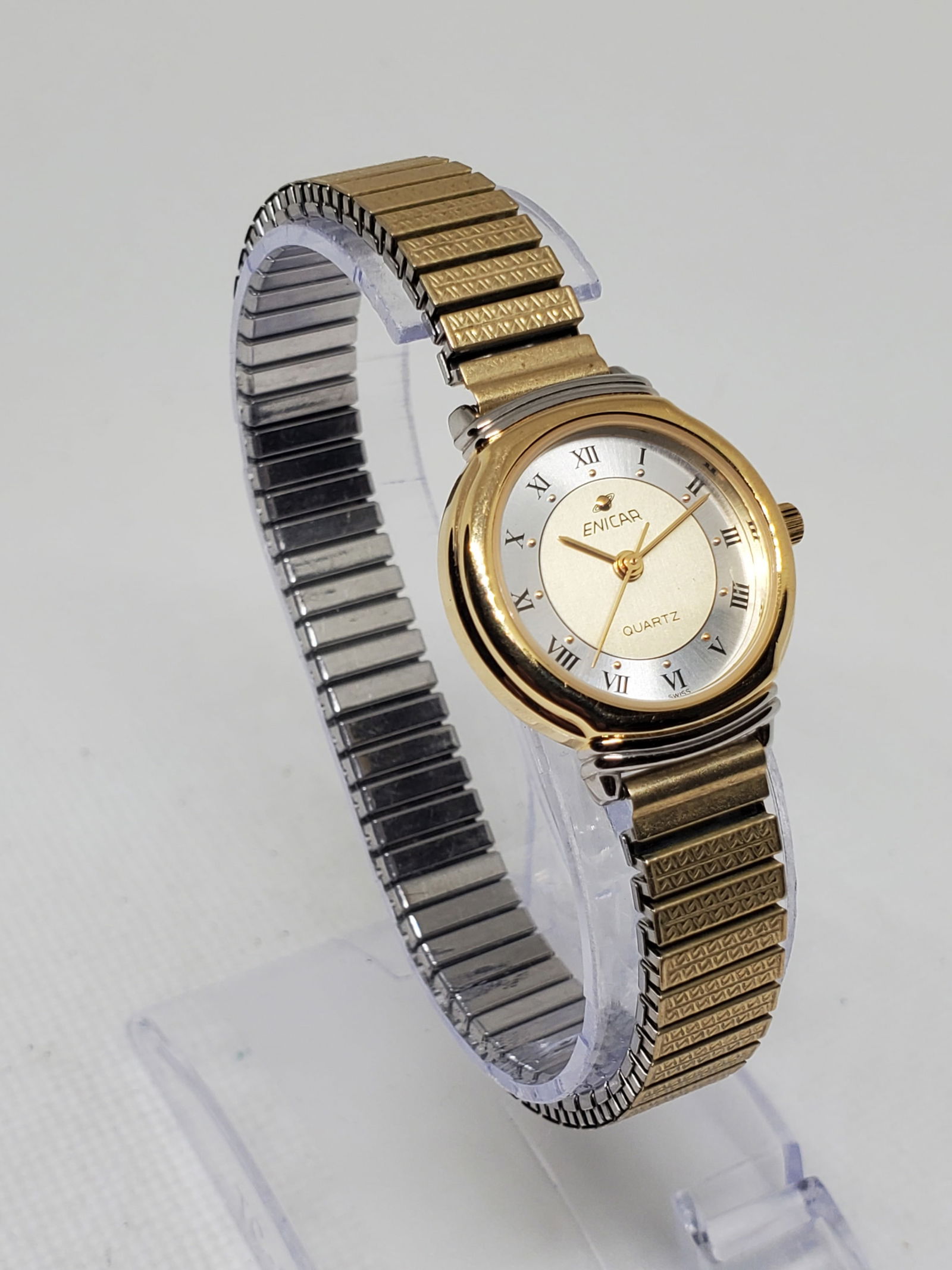 Enicar Swiss Quartz 596.371L Gold Plated Ladies Watch Roman Numerals 24mm, 1990s: This elegant Enicar 596.371L ladies watch showcases the refined Swiss craftsmanship that has defined the brand since its founding by Ariste Racine in La Chaux de Fonds in 1913. Enicar is celebrated fo