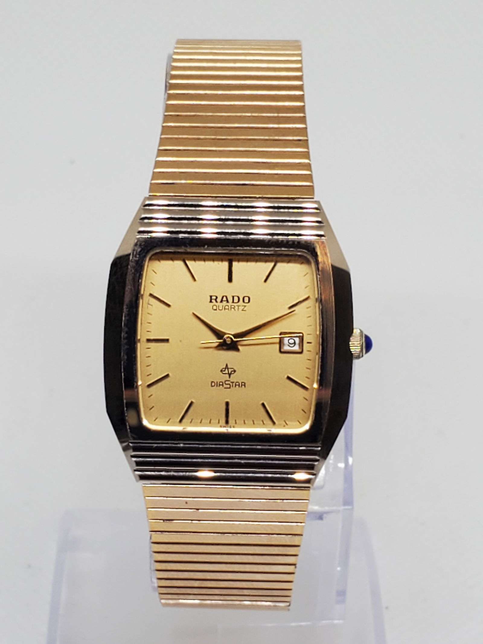 Rado DiaStar Tungsten Carbide Watch, 1980s: Working condition Rado DiaStar 111.9501.3 is the perfect blend of luxury and durability. The gold tone square dial and the 7" wrist size metallic bracelet are designed for elegance and everyday use. A