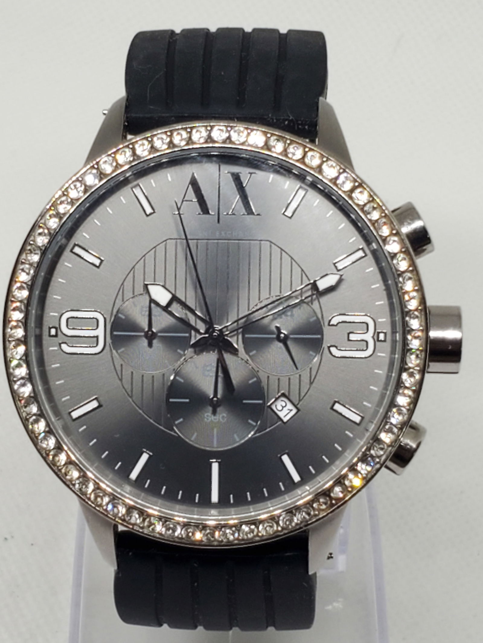 Armani Exchange AX1270 Chronograph Men?s Watch, Crystal Bezel, Gray Dial, 48mm: This Armani Exchange AX1270 chronograph men?s watch showcases a striking combination of modern style and sporty refinement. Its silver-tone stainless steel case (48mm) is accented by a sparkling cryst