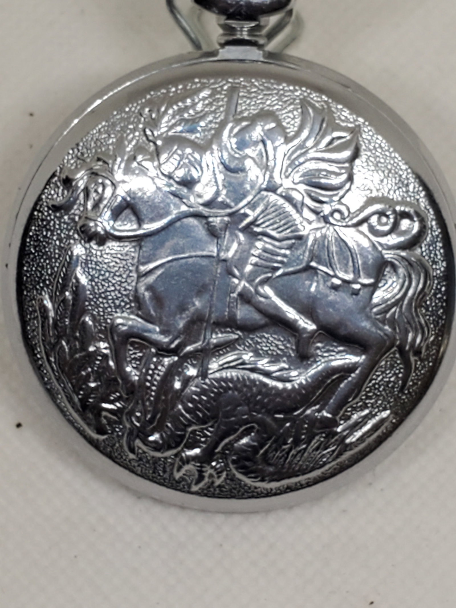 Rare Monlija Russian Manual Pocket Watch 3602 Movement Russian Crest and St. George designs, 50mm,: This exquisite Monlija Incabloc pocket watch showcases exceptional craftsmanship and timeless appeal. The piece features a silvertone case adorned with intricate engravings of St. George slaying the d