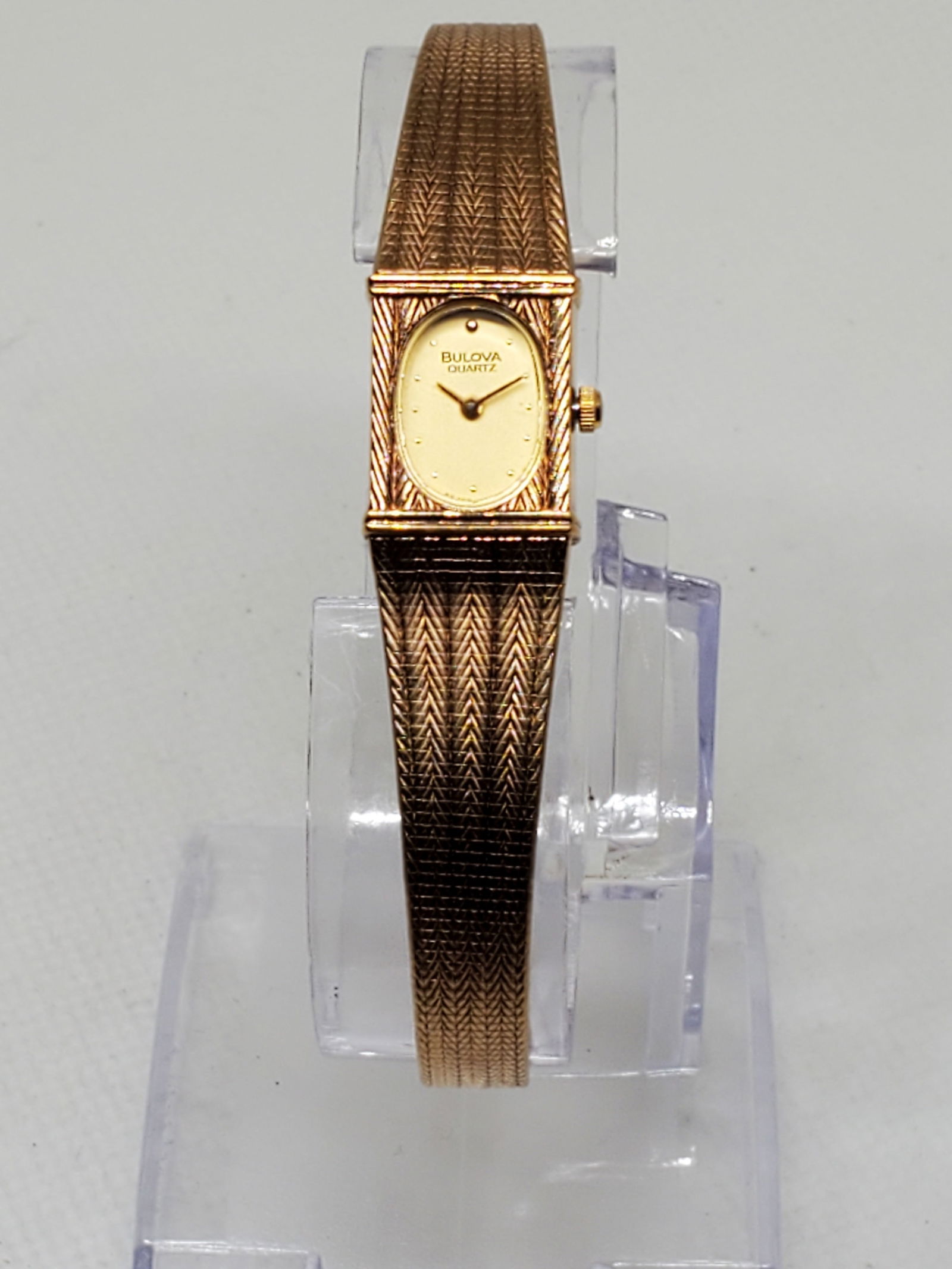 Bulova Gold Plated Ladies Watch, 1980s: Add a touch of timeless elegance to your collection with this stunning Bulova P6 luxury watch. Designed for those who appreciate sophistication, this exquisite timepiece features a gold plated square