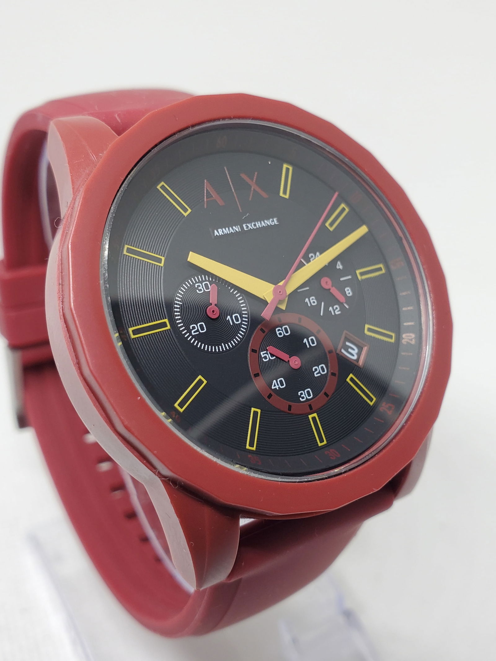 Armani Exchange AX7125 Red Chronograph Sport Watch Silicone Strap, 2018 to 2020: Armani Exchange AX7125 is a bold and contemporary chronograph watch that reflects the brand?s modern urban elegance and fashion driven prestige. Founded in 1991 in Milan by Giorgio Armani, Armani Exch