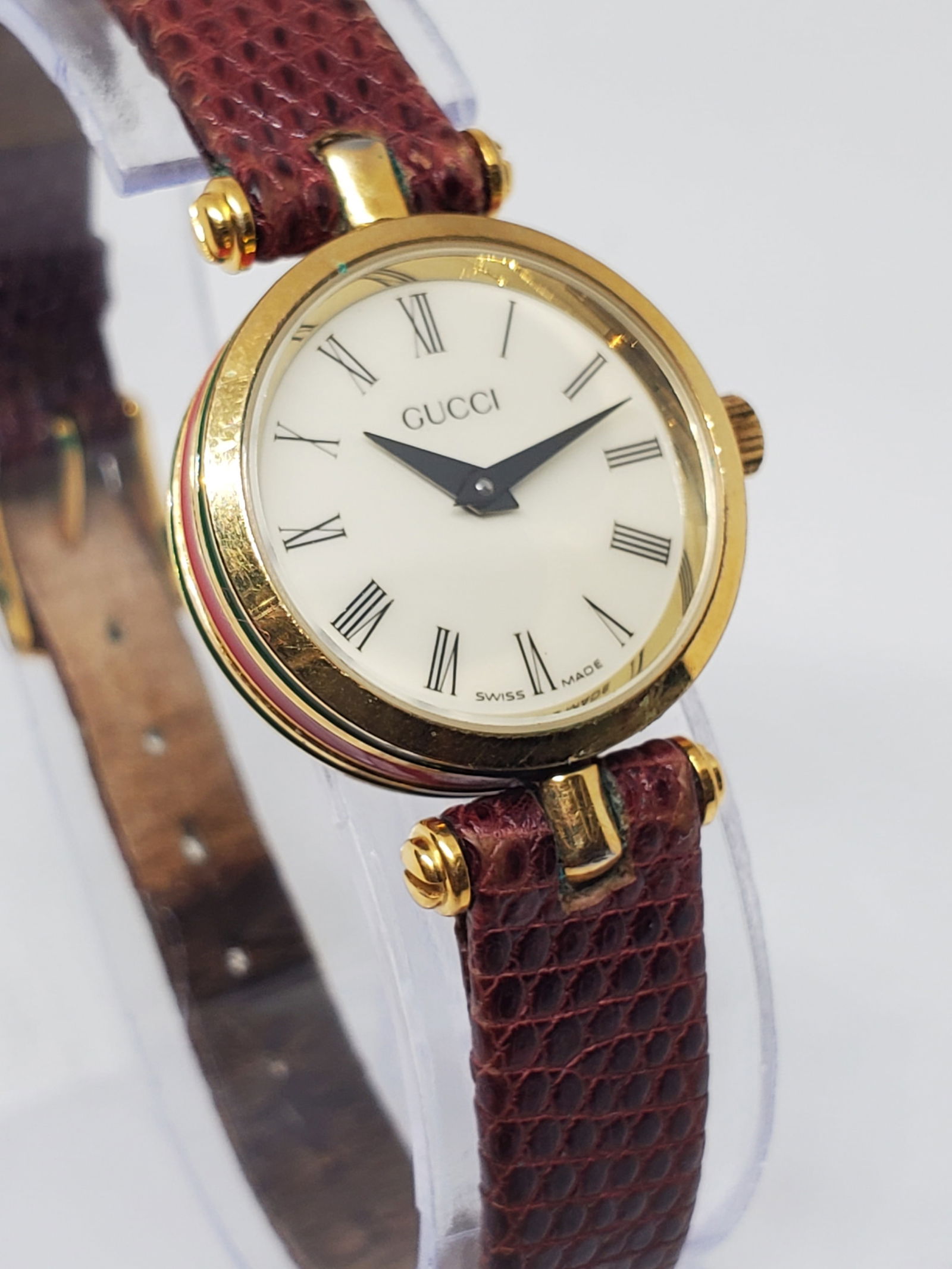 Gucci Sherry Line 2000L Gold Plated Gold Dial Swiss Quartz Dress Watch, 1990s: This refined Gucci Sherry Line model 2000L exemplifies the understated elegance and prestige that have defined the brand for decades, featuring a gold plated case paired with a gold dial accented by t