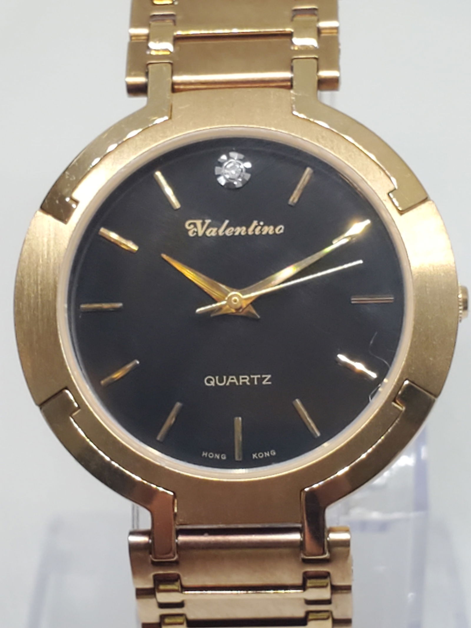 Valentino Gold Plated Unisex Watch, 1990s: Experience timeless elegance with this stunning Valentino dress watch in operating condition, a perfect blend of luxury and sophistication. Designed for those who appreciate fine craftsmanship, this q