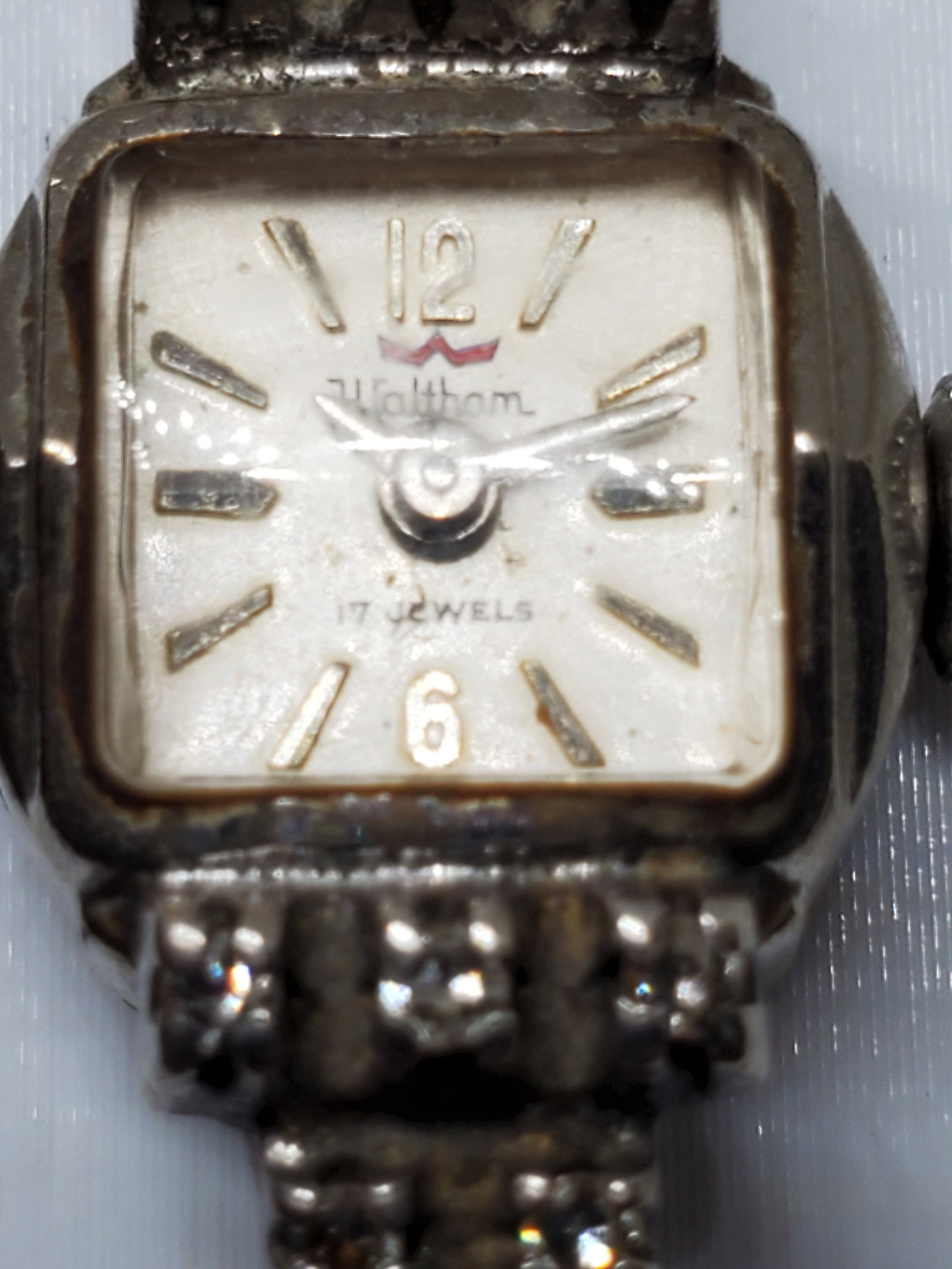 Waltham Rolled Gold Plated with 12 Diamonds Watch, Manual, 1940s: Working condition Waltham 12 Diamond Luxury Timepiece, a refined symbol of elegance and historic prestige. This watch embodies the luxurious quality that vintage collectors adore, with its white gold