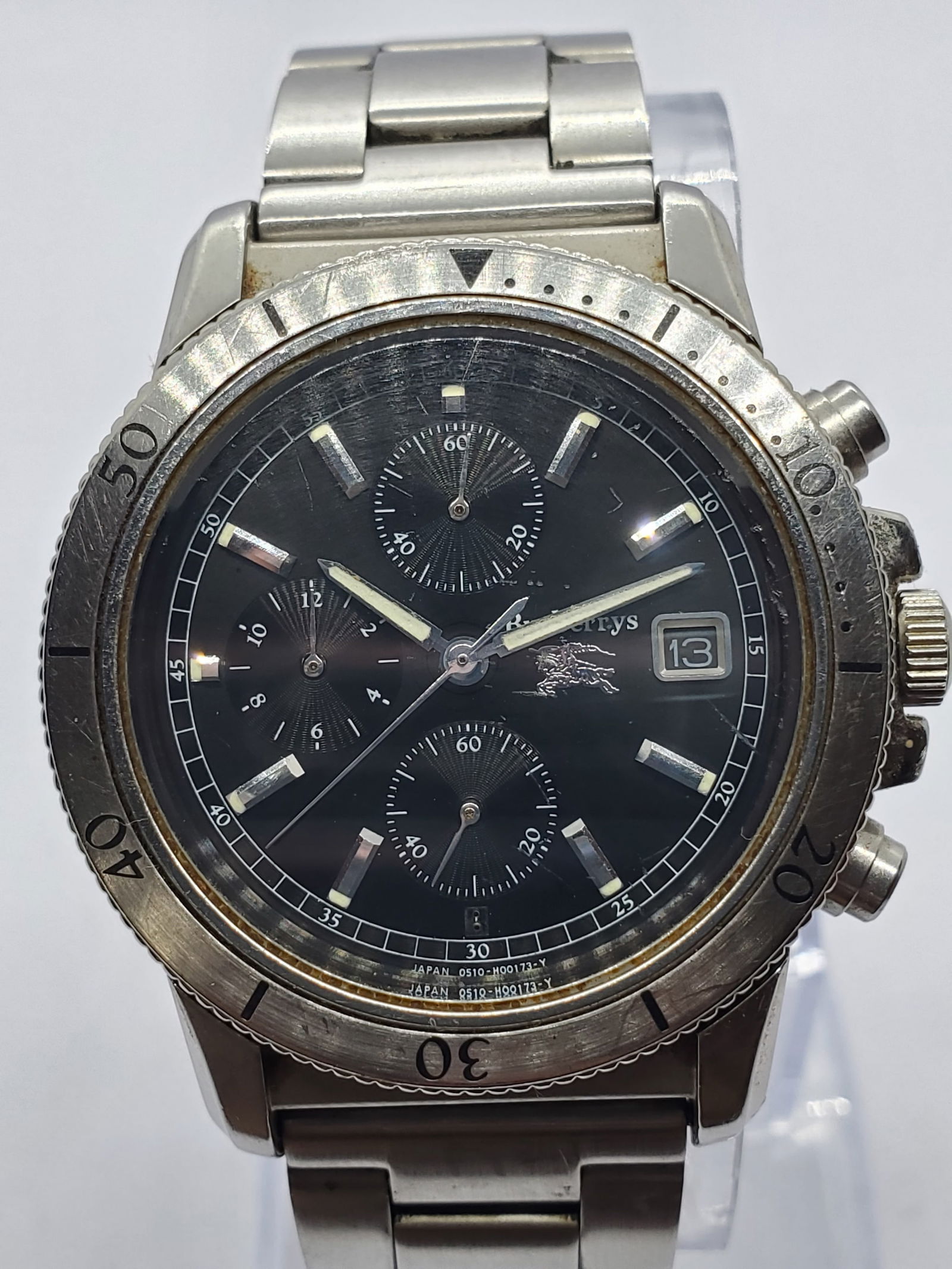 Burberry Chronograph Quartz 38 mm Silver Dress Watch Classic Luxury, 1998 to 2003: This Burberry model 0510 C500898 quartz watch blends refined elegance with sporty chronograph functionality, showcasing the prestige and durability associated with the Burberry name. Founded by Thomas