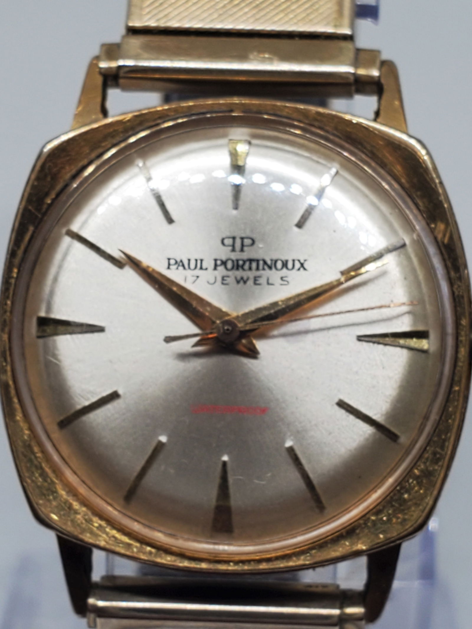 Paul Portinoux Gold Plated Manual Watch, 1960s: Indulge in the timeless sophistication of this Paul Portinoux luxury watch (running), a true vintage treasure for collectors and enthusiasts alike. With its elegant gold plated case and refined silver