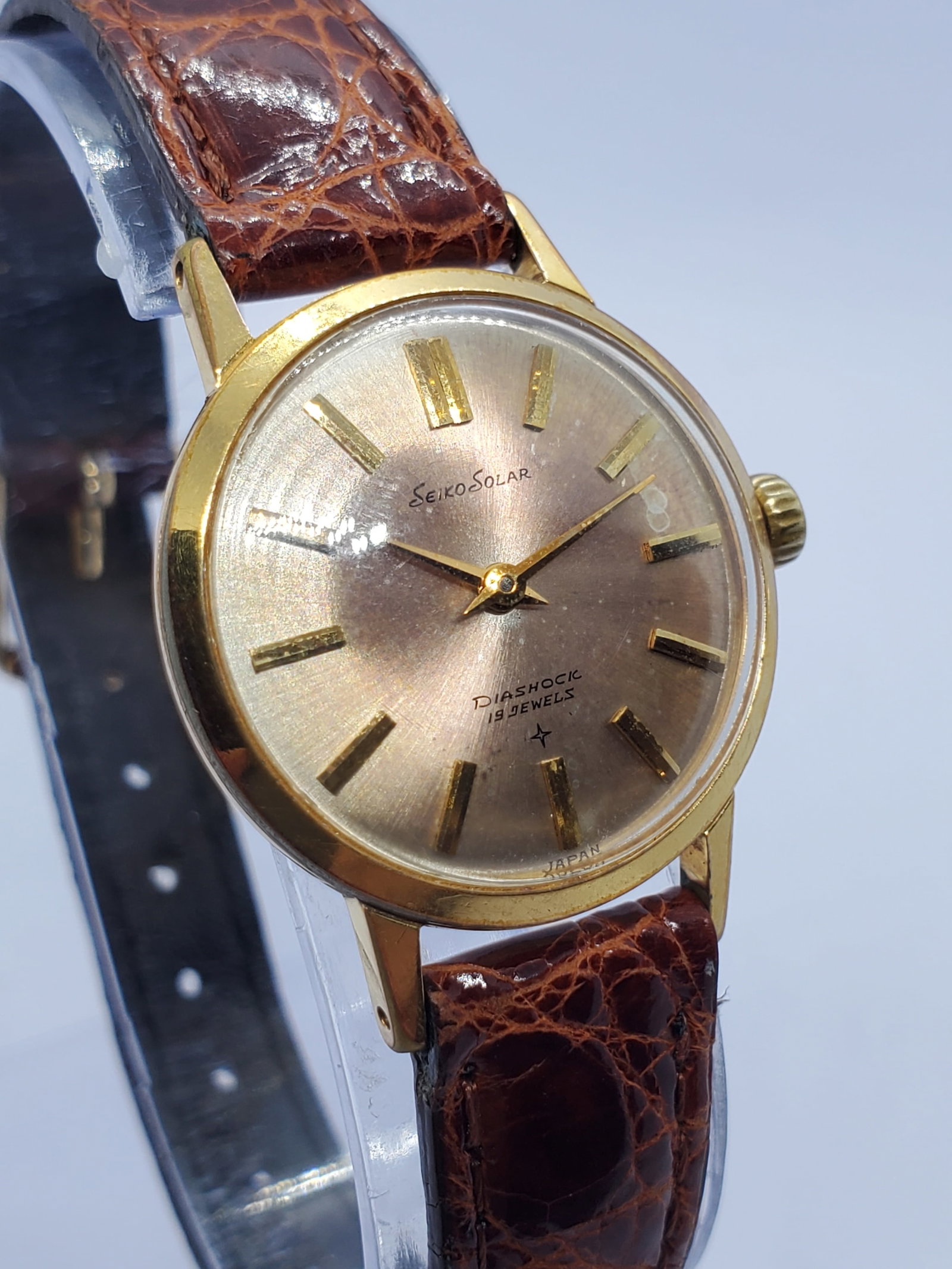 Vintage Seiko Solar 615 Gold Plated Rose Patina Dress Watch Manual Wind, mid 1960s, Working: This vintage Seiko Solar 615 exemplifies the refined elegance and precision craftsmanship that define Seiko, a Japanese watchmaker founded by Kintaro Hattori in 1881 in Tokyo and globally respected fo
