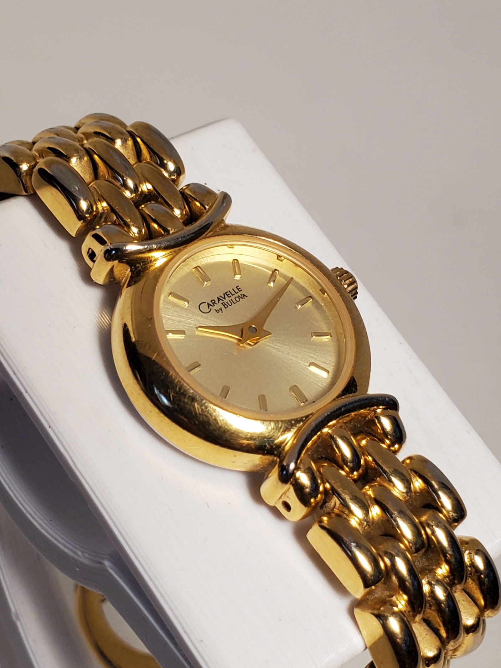 Vintage Bulova Caravelle T9 Gold Tone Quartz Dress Watch, late 80s to early 90s, Working: This elegant Bulova Caravelle T9 48H82 dress watch reflects timeless refinement and everyday reliability, combining a gold plated case with a warm gold dial and applied gold markers for a classic, und