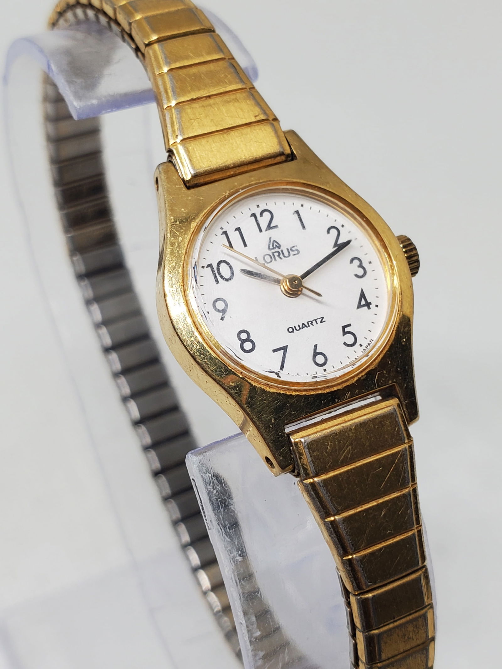 Seiko Lorus Gold Tone Quartz Dress Watch White Dial Vintage Classic, 1990s, Working: This Seiko Lorus quartz dress watch offers understated elegance and everyday reliability, reflecting the practical prestige associated with the Seiko family of brands. Featuring a gold plated case pai