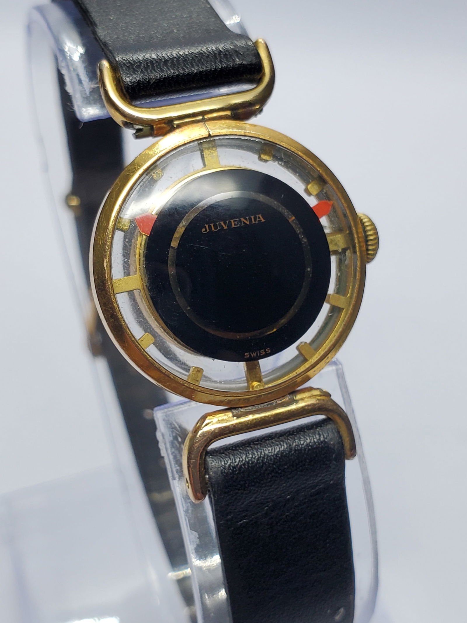 Vintage Juvenia Mystere Floating Hands Dress Watch Skeleton Back Swiss, 1960s: This elegant Juvenia Mystere manual wind dress watch showcases one of the brand?s most intriguing design concepts with its distinctive ?floating hands? dial. The minimalist black center dial creates t