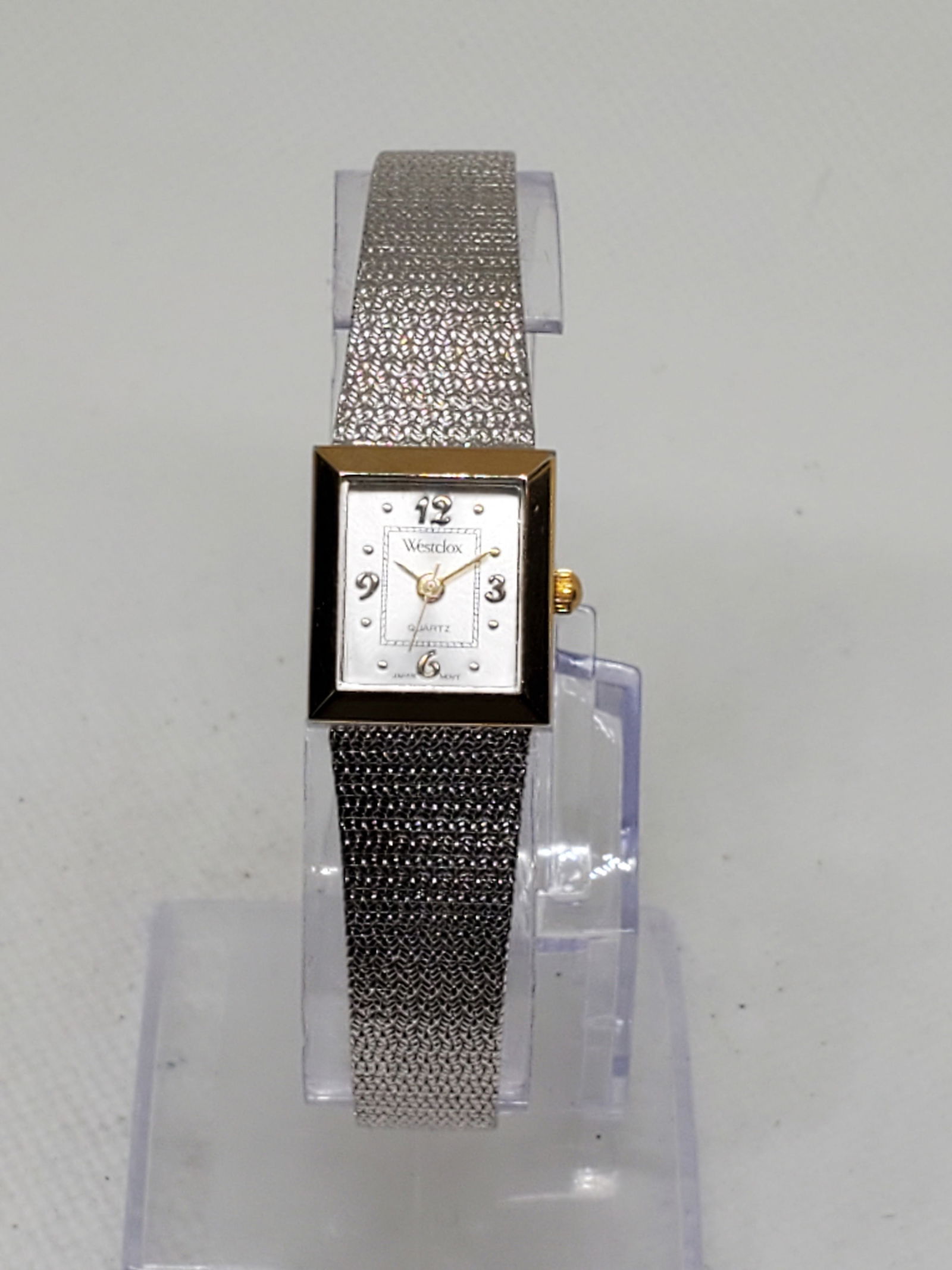 Vintage Westclox LTX191 Silver Gold Rectangular Watch Japan Quartz 7? Mesh Band, 1990s, Working: This elegant vintage Westclox LTX191 features a refined rectangular dual tone case in silver and gold, complemented by a starburst silver dial with gold hour markers and stylized numerals at 12, 3, 6,