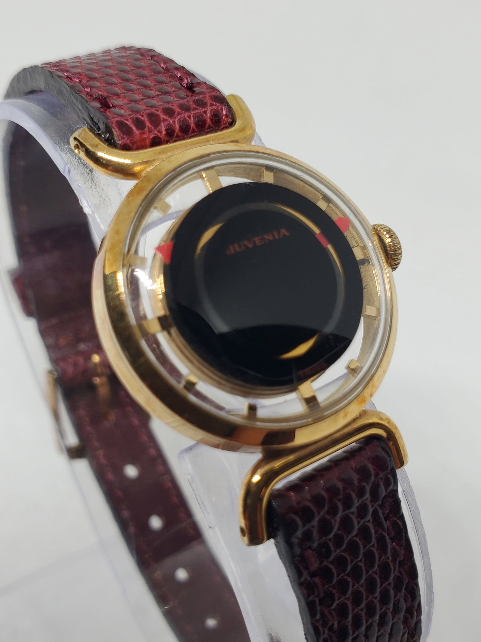 Juvenia Mystere Skeleton Manual Gold Plated Swiss Dress Watch 22mm, 1960s, Working: This elegant Juvenia Mystere dress watch represents one of the brand?s most distinctive and collectible designs, celebrated for its refined mystery dial that creates the illusion of floating hands, a