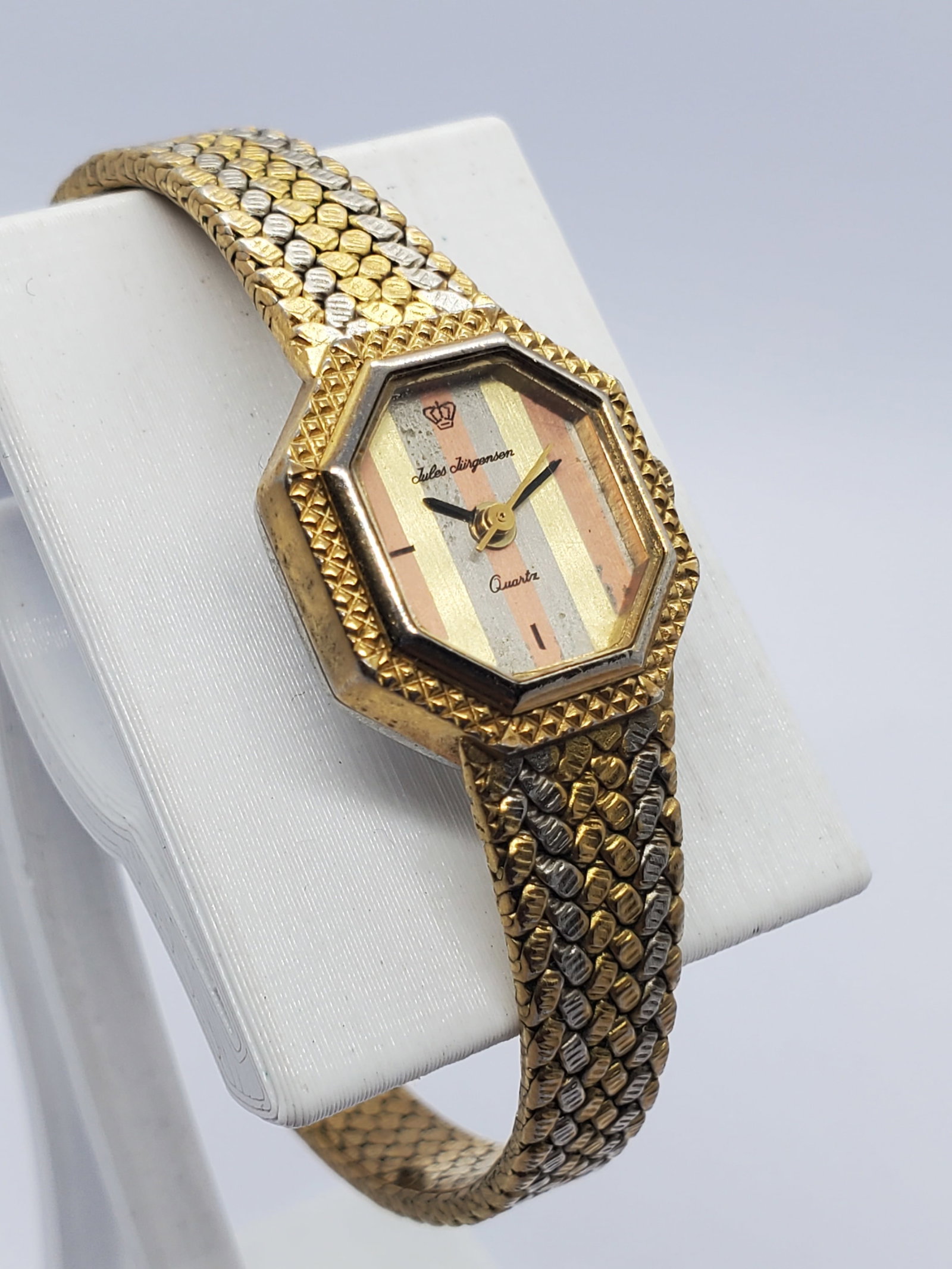 Vintage Jules Jurgensen 6510 Gold Tone Octagonal Watch Multitone, 1980s, Working: This vintage Jules Jurgensen model 6510 quartz watch showcases a distinctive blend of elegance and bold design that reflects the brand?s long standing reputation for refined yet expressive timepieces.