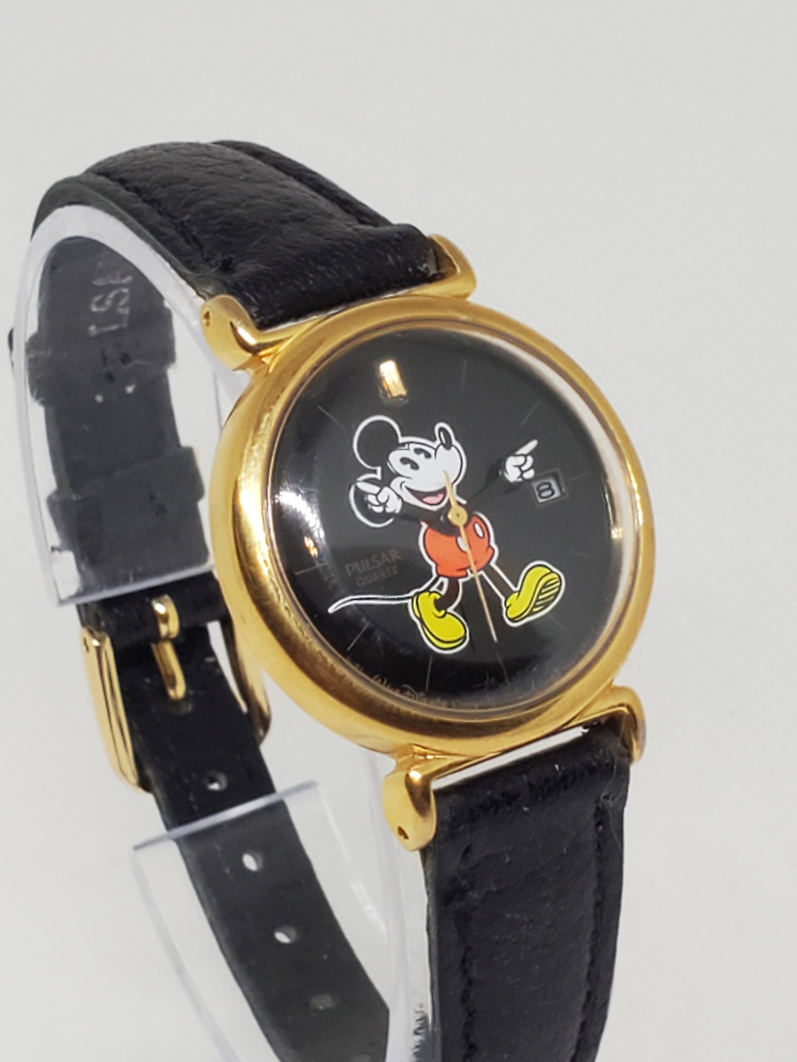 Pulsar by Seiko Gold Plated Mickey Mouse Watch, 1990s, Working: Pulsar by Seiko Gold Plated Mickey Mouse Watch V827-0090, 1990s - Vintage Collection - Elevate your collection with the Seiko Pulsar Disney V827-0090, a timepiece that perfectly balances luxury and wh