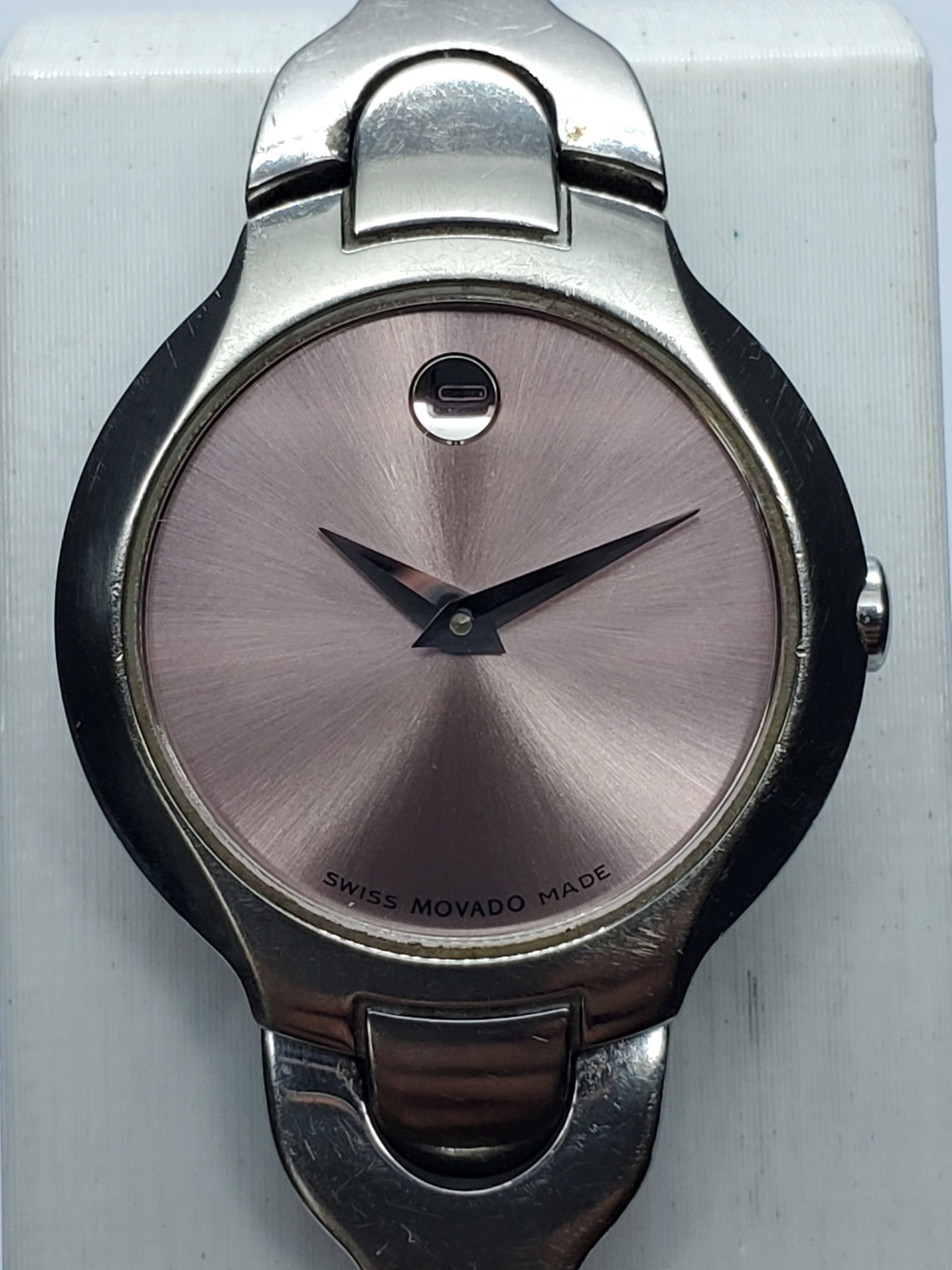 Movado Amorosa Museum Rose Sunburst Dial Swiss Bangle Watch 24mm, 2004, Working: This elegant Movado Museum Amorosa model 84.A1.1846 quartz dress watch showcases the timeless Bahaus minimalist design that made Movado internationally famous. Founded in 1881 in La Chaux de Fonds Swi