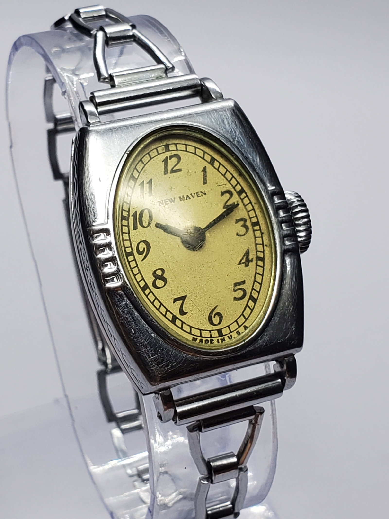Vintage New Haven Art Deco Manual Watch Champagne Dial Hexagonal Case, 1930s, Working: This vintage New Haven Art Deco manual wind watch reflects the elegant geometric styling that defined early twentieth century timepieces. The watch features a distinctive silver tone hexagonal case me