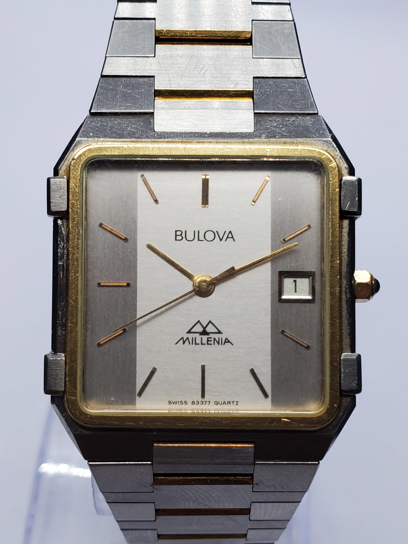 Bulova Millenia Tone Quartz Watch 30x30mm, 1990s, Working: This elegant Bulova Millenia quartz dress watch showcases the refined design language that made Bulova a global leader in timekeeping innovation. Founded in 1875 in New York by Joseph Bulova, the bran