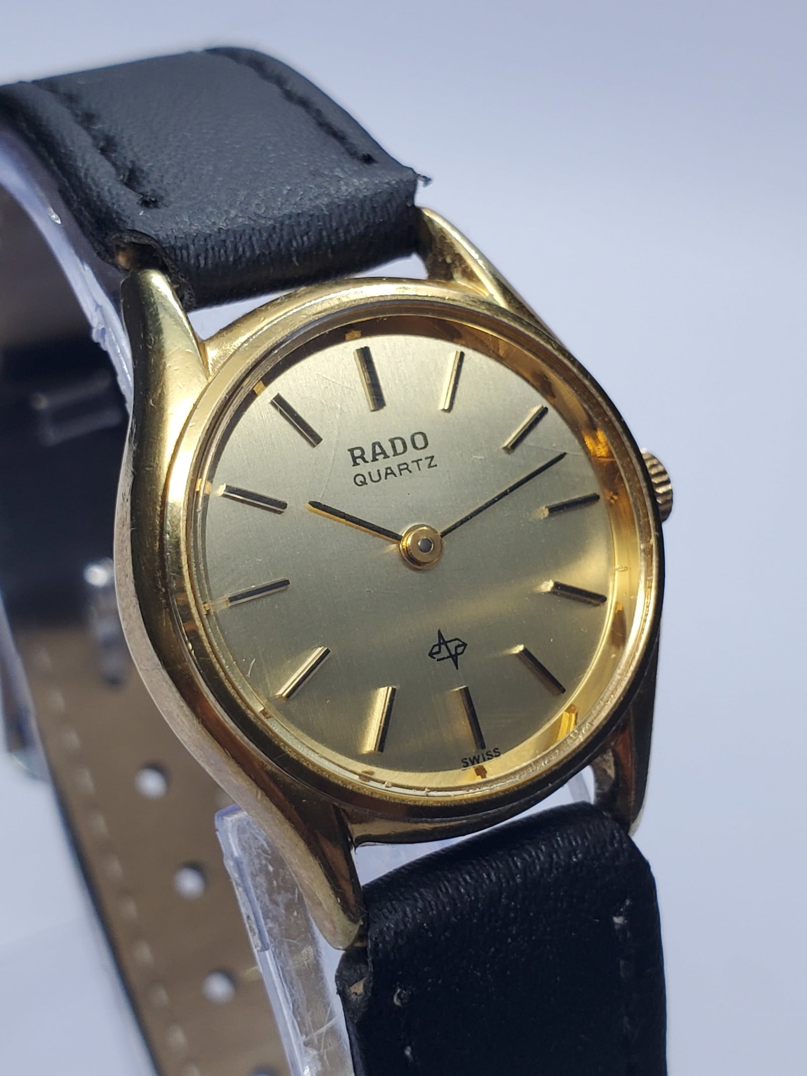 Rado Gold Plated Quartz Watch 23mm, 1980s, Working: Elegant and understated, this Rado 717.9017.2 quartz watch reflects the brand?s reputation for refined Swiss design and long lasting durability, featuring a gold plated case paired with a warm gold di
