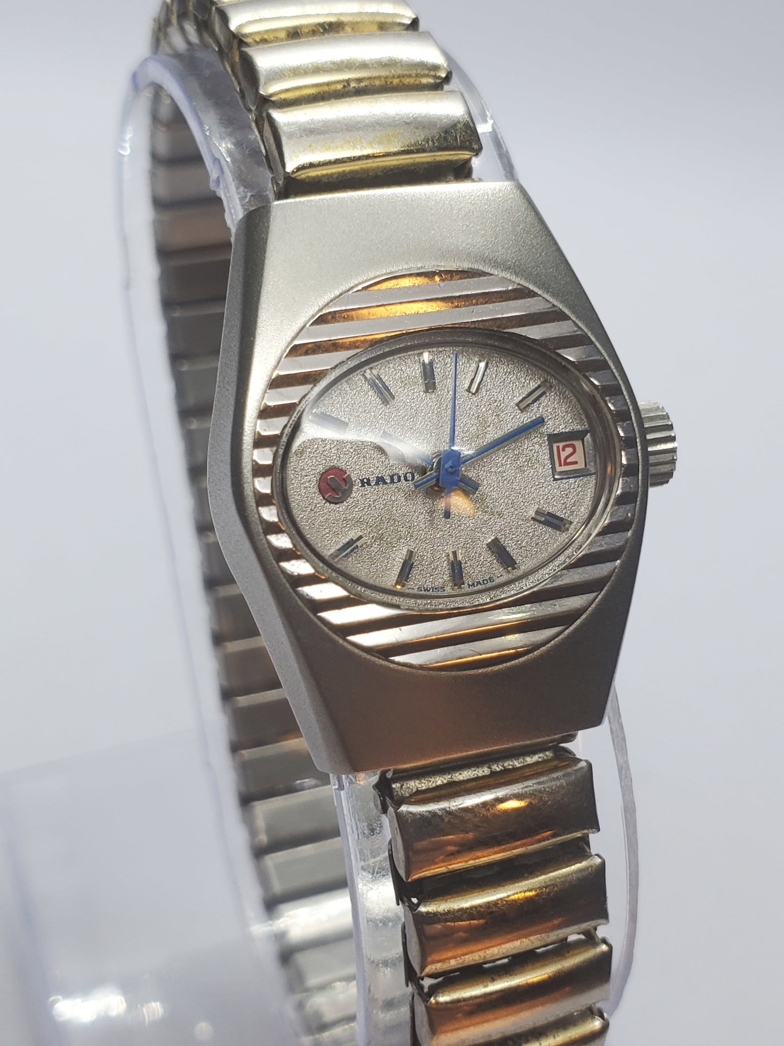 Vintage Rado 7072 Automatic Date Swiss Watch, 21x27mm, 1960s, Working: Elegant and distinctly collectible, this vintage Rado 7072 Golden Seals automatic dress watch showcases the innovative spirit that made Rado a celebrated Swiss name among collectors worldwide. Founded