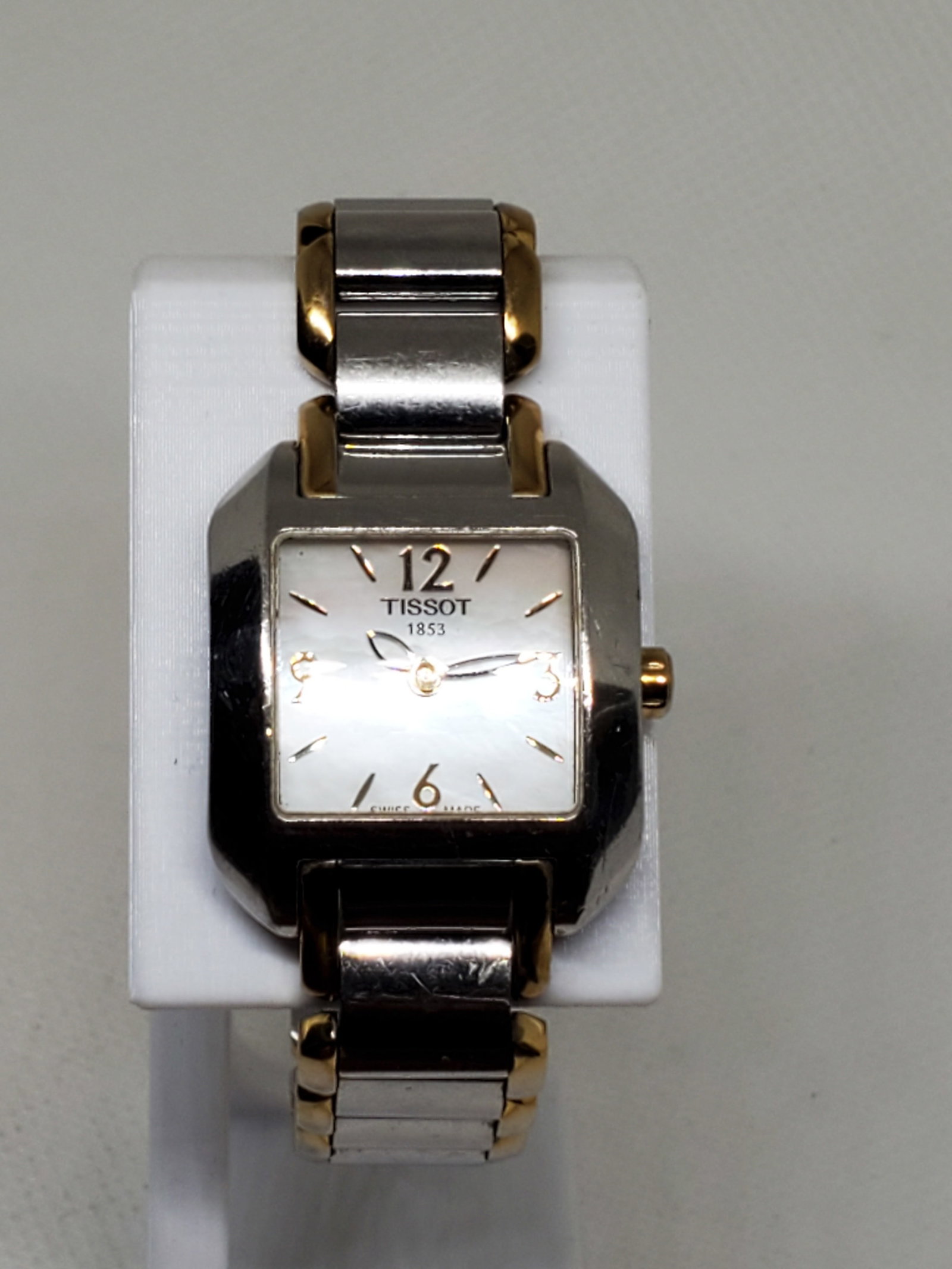 Tissot 1853 Mother of Pearl, Gold Plated Accents Watch, 2000s, Working: Working condition Tissot 1853 L750/850 luxury watch. The silver tone Mother of Pearl dial adorned with subtle gold plated accents radiates elegance, making it a perfect companion for both casual and f