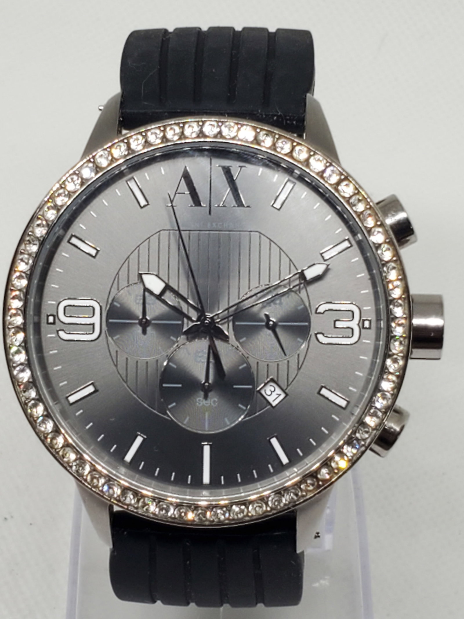 Armani Exchange AX1270 Chronograph Men?s Watch, Crystal Bezel, Gray Dial, 48mm, Working: This Armani Exchange AX1270 chronograph men?s watch showcases a striking combination of modern style and sporty refinement. Its silver-tone stainless steel case (48mm) is accented by a sparkling cryst