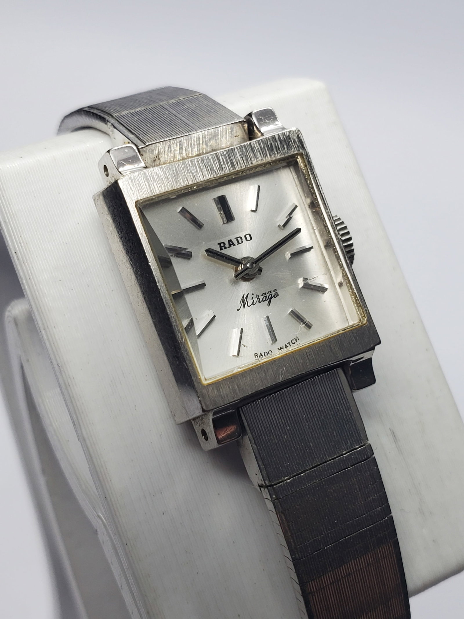 Rado Mirage Square Cut Glass Manual Swiss Watch, 1960s, Working: Elegant and distinctive, this Rado Mirage manual wind watch reflects the refined craftsmanship that made Rado a respected name in Swiss horology. Founded in 1917 in Lengnau Switzerland, Rado is celebr