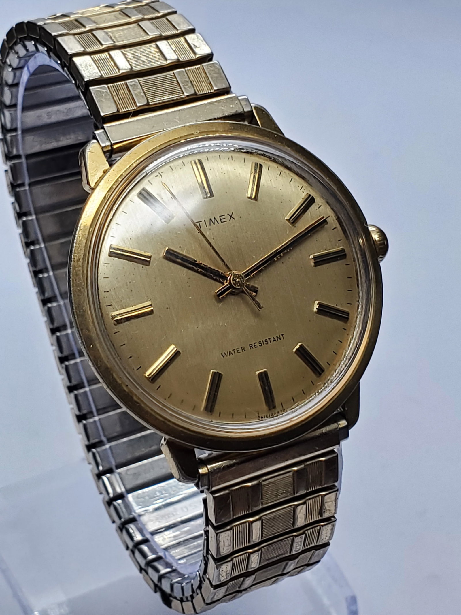 Timex Marlin Manual Gold Tone Watch, 35mm, 1978, Working: Discover timeless American watchmaking with this vintage Timex Marlin manual wind dress watch, a refined classic from one of the most recognized names in horology. Founded in 1854 in Waterbury, Connec