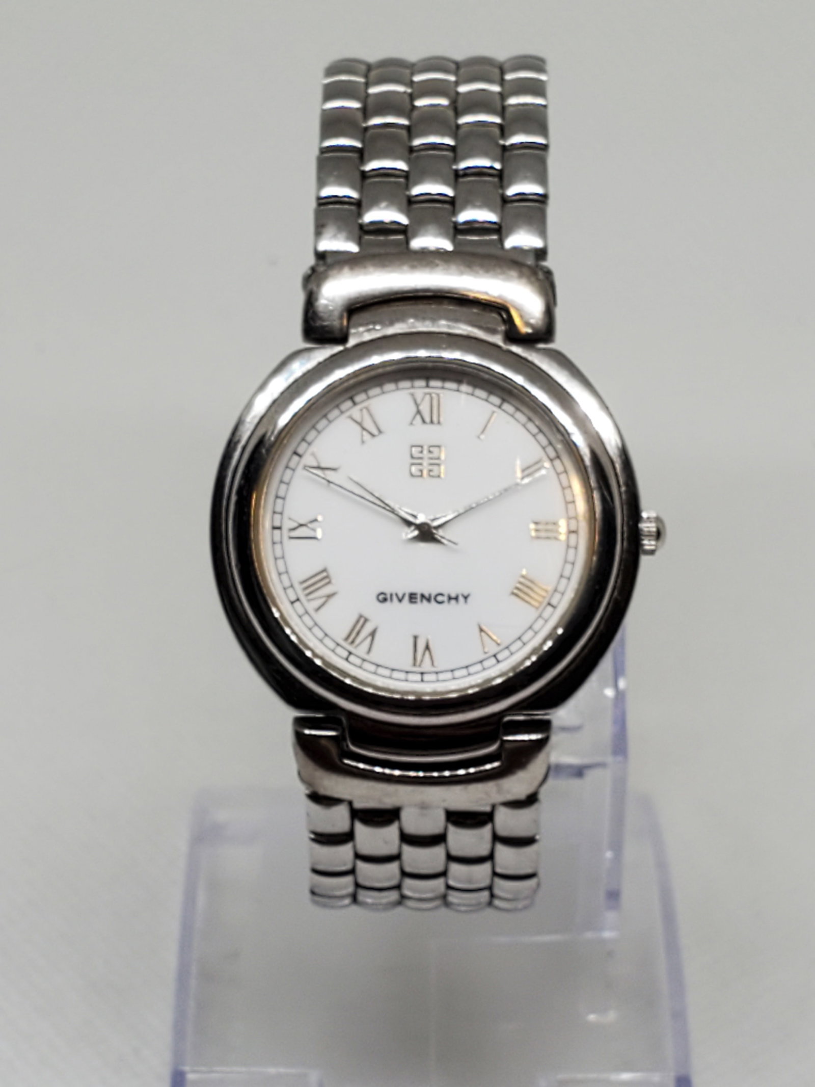Givenchy Cruise Silver Tone Ladies Watch, 1990s, Working: This elegant Givenchy Cruise 109 reflects the timeless prestige of the French fashion house. Designed with a silver tone case and a clean white dial adorned with Roman numerals, it embodies understate