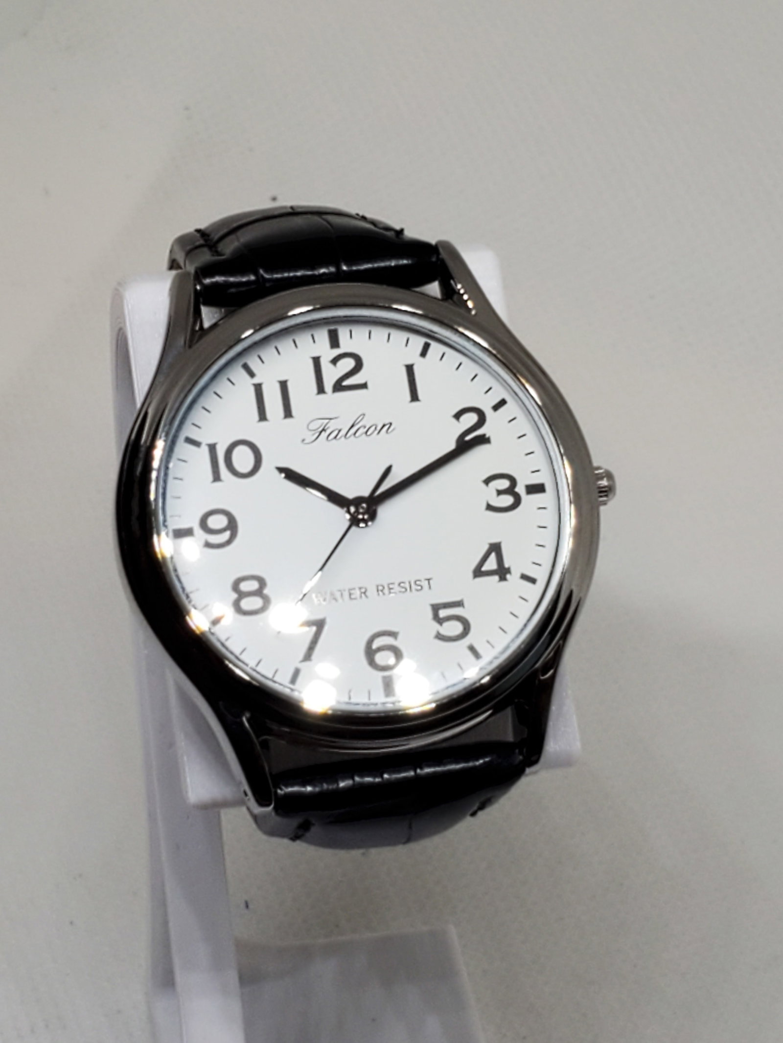 Citizen QQ Falcon Watch, New, Running: Introducing the Citizen Q&Q Falcon, a timepiece that beautifully blends elegance and casual style with the prestige of a brand known for its innovation. With its sleek 35 mm case, white dial, and clas